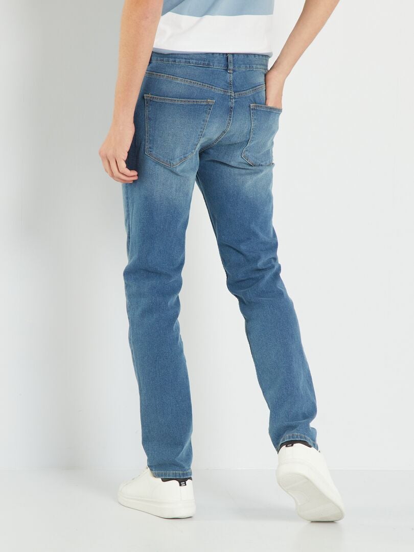 Calça jeans slim - tamanho 32 - cor pedra usada