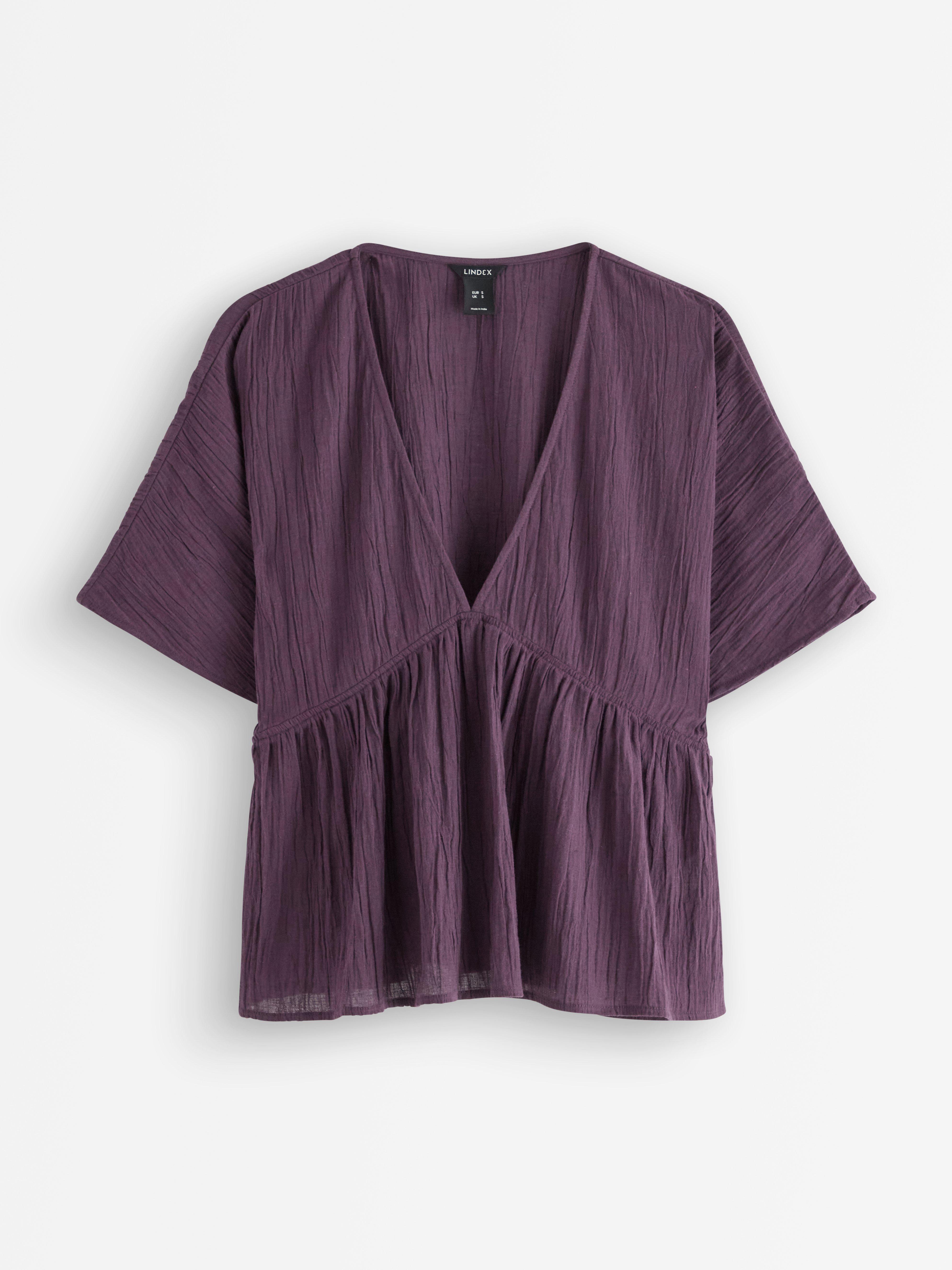Blusa de manga corta color lila oscuro empolvado