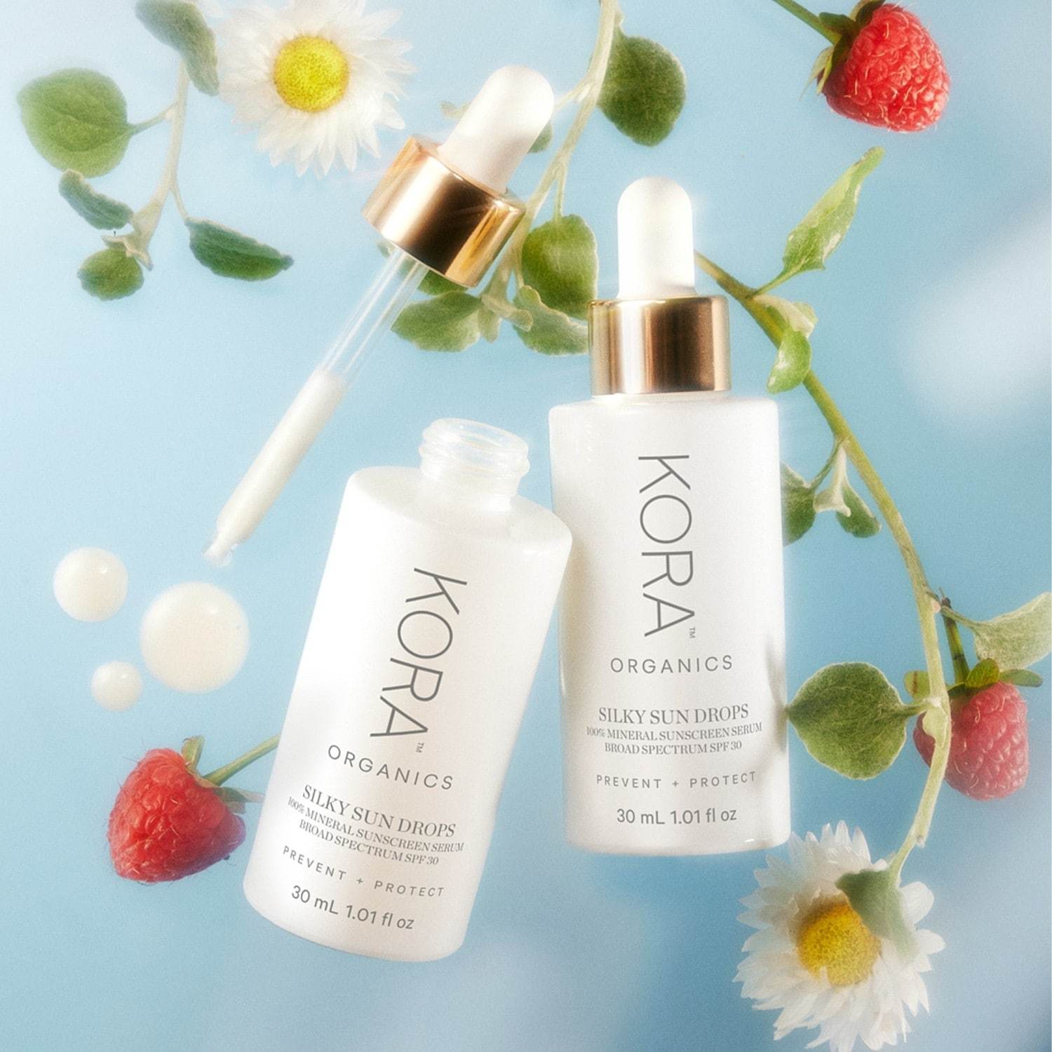 KORA Organics Serum proti staranju Silky Sun Drops 100% mineralni serum za zaščito pred soncem - 30 ml