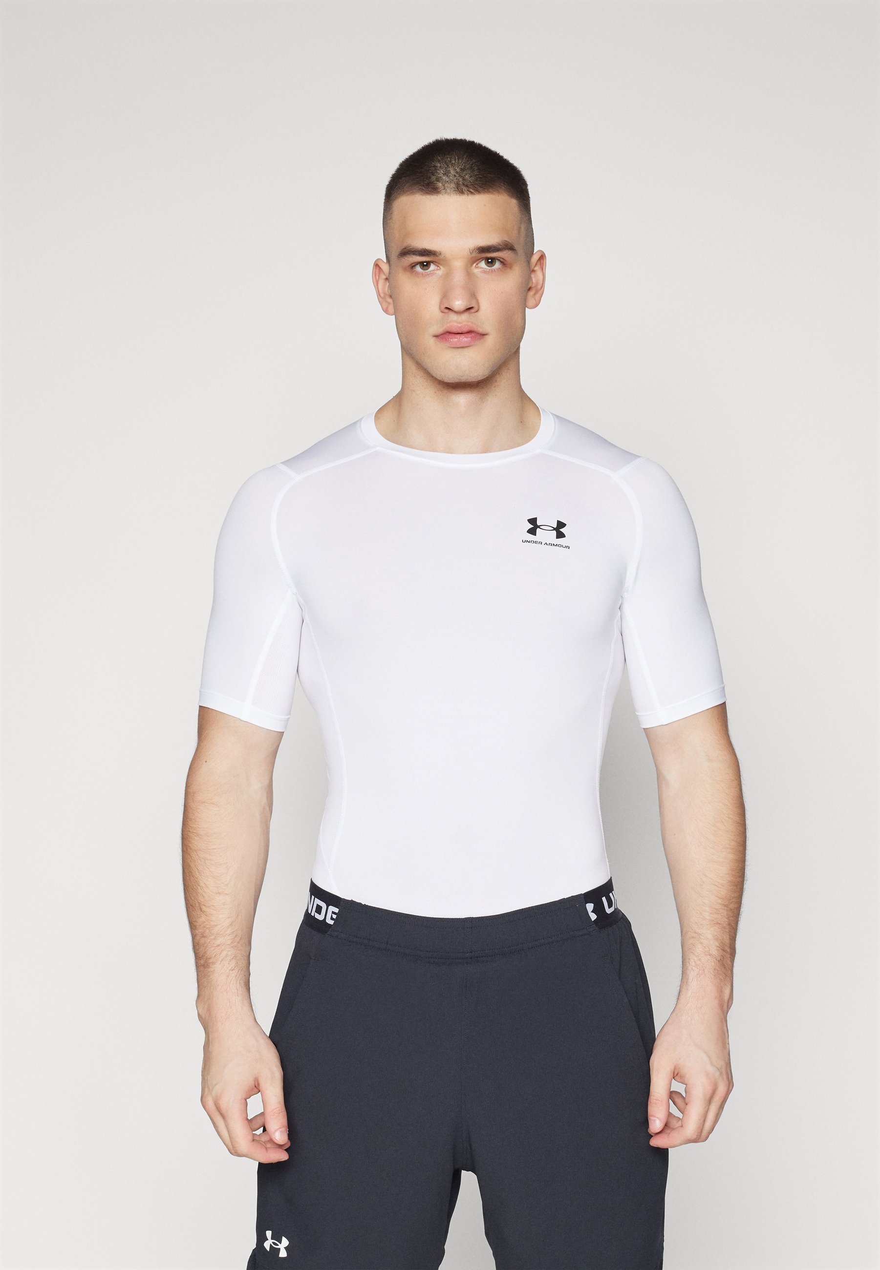 Under Armour HEATGEAR - T-shirt sportiva - bianco/nero