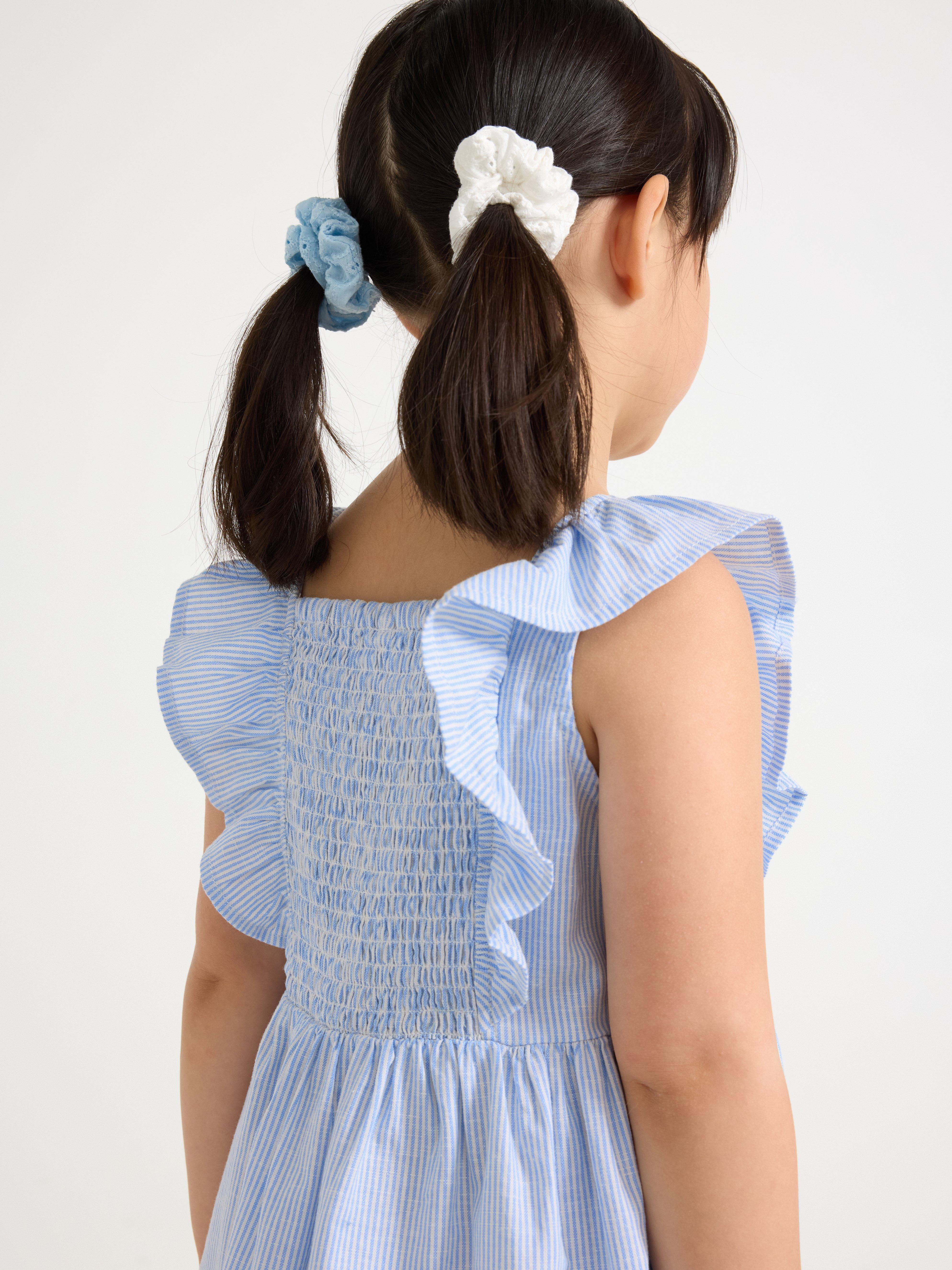 Vestido con volantes azul claro