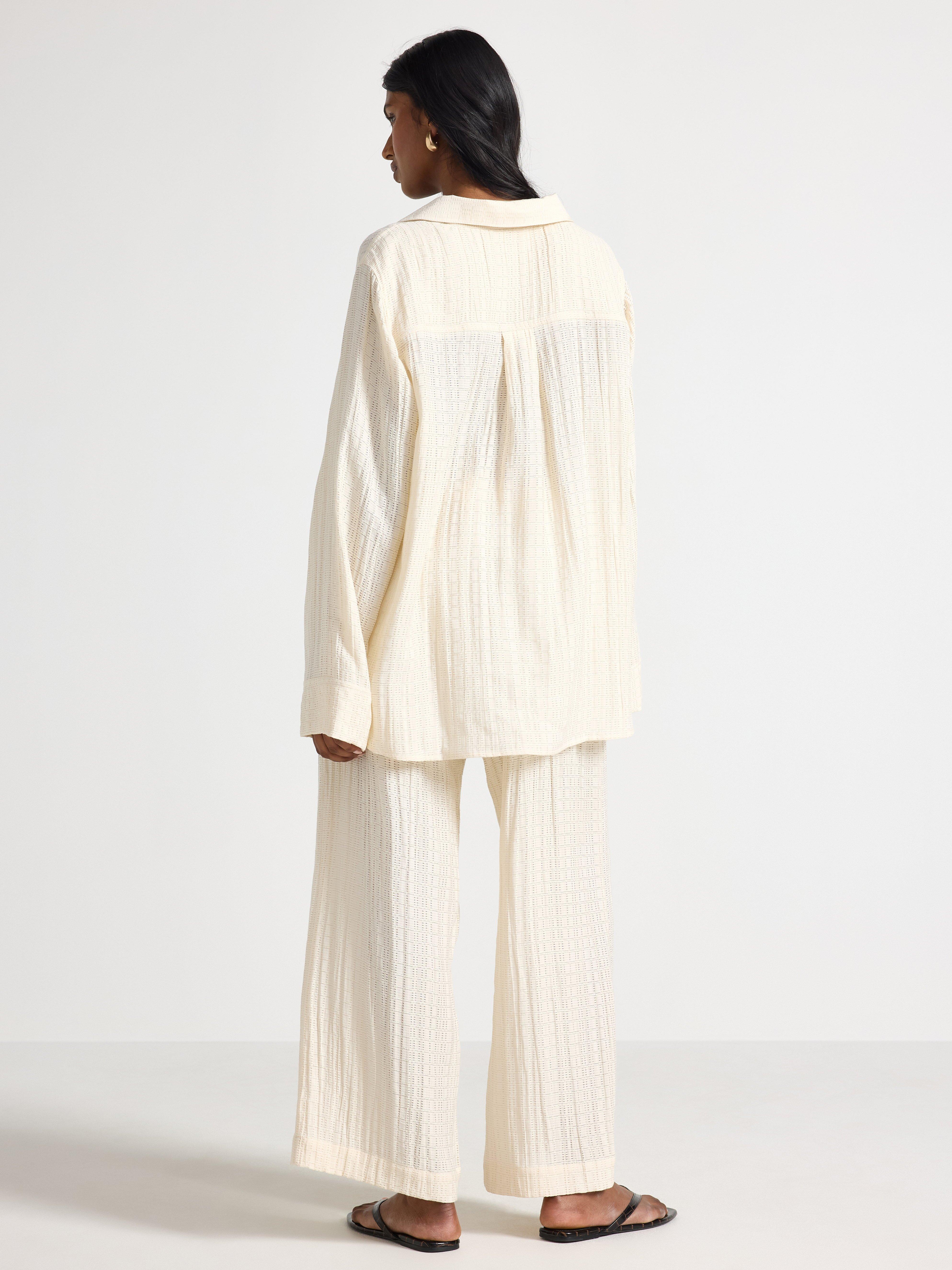 LYKKE Los pantalones anchos Blanco roto