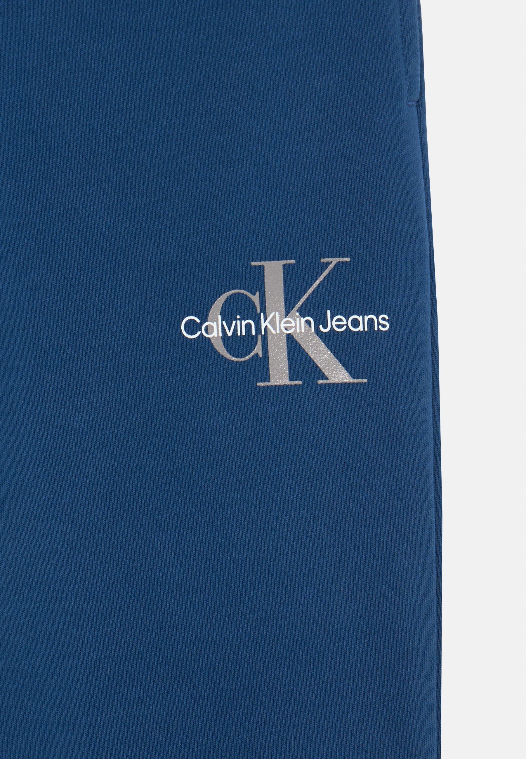 Pantaloni Calvin Klein Jeans con logo monogramma unisex - Pantaloni da tuta - jeans blu