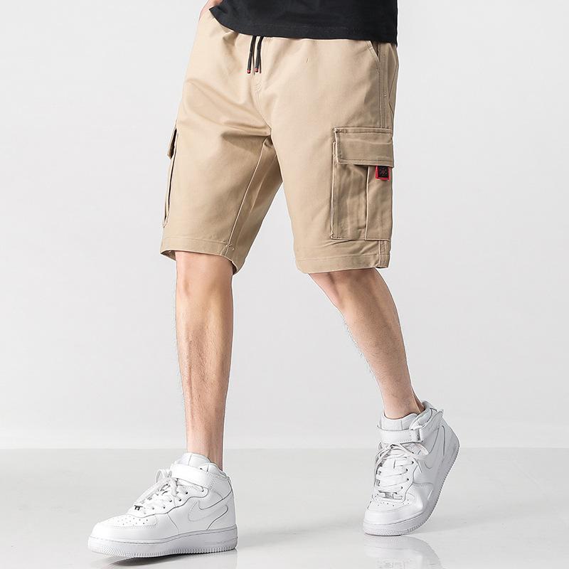 Zomerse katoenen overall in een nieuwe stijl, effen kleur, met riem, korte broek voor heren, losvallende, rechte vijfpuntsbroek