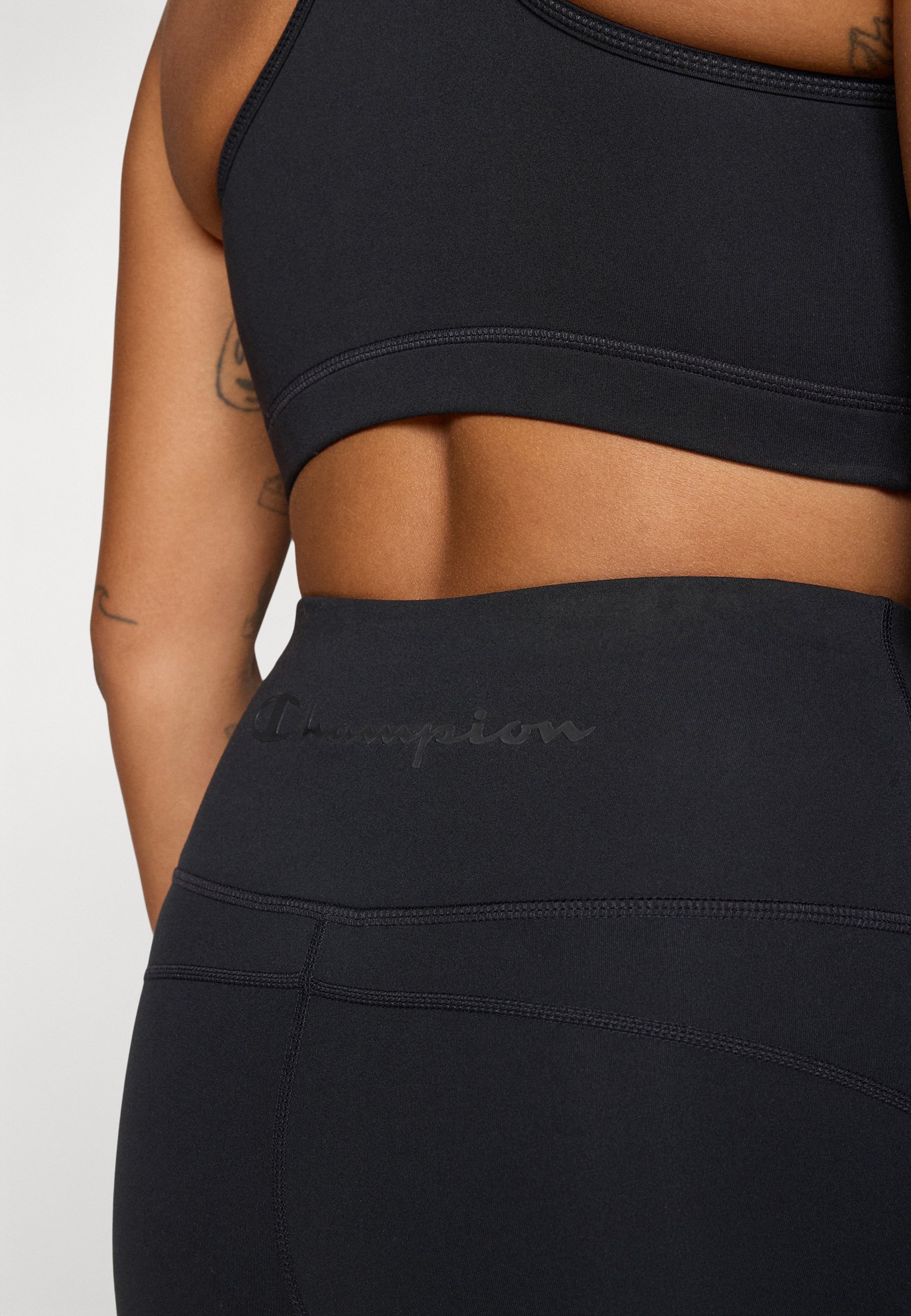 Champion TRAINING FLARE LEGGINGS INTERLOCK - Leggings - zwart