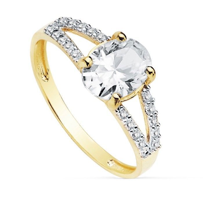 Two-tone solitaire ring in 18-carat gold with an 8 x 6 mm oval zirconia. Two bands.