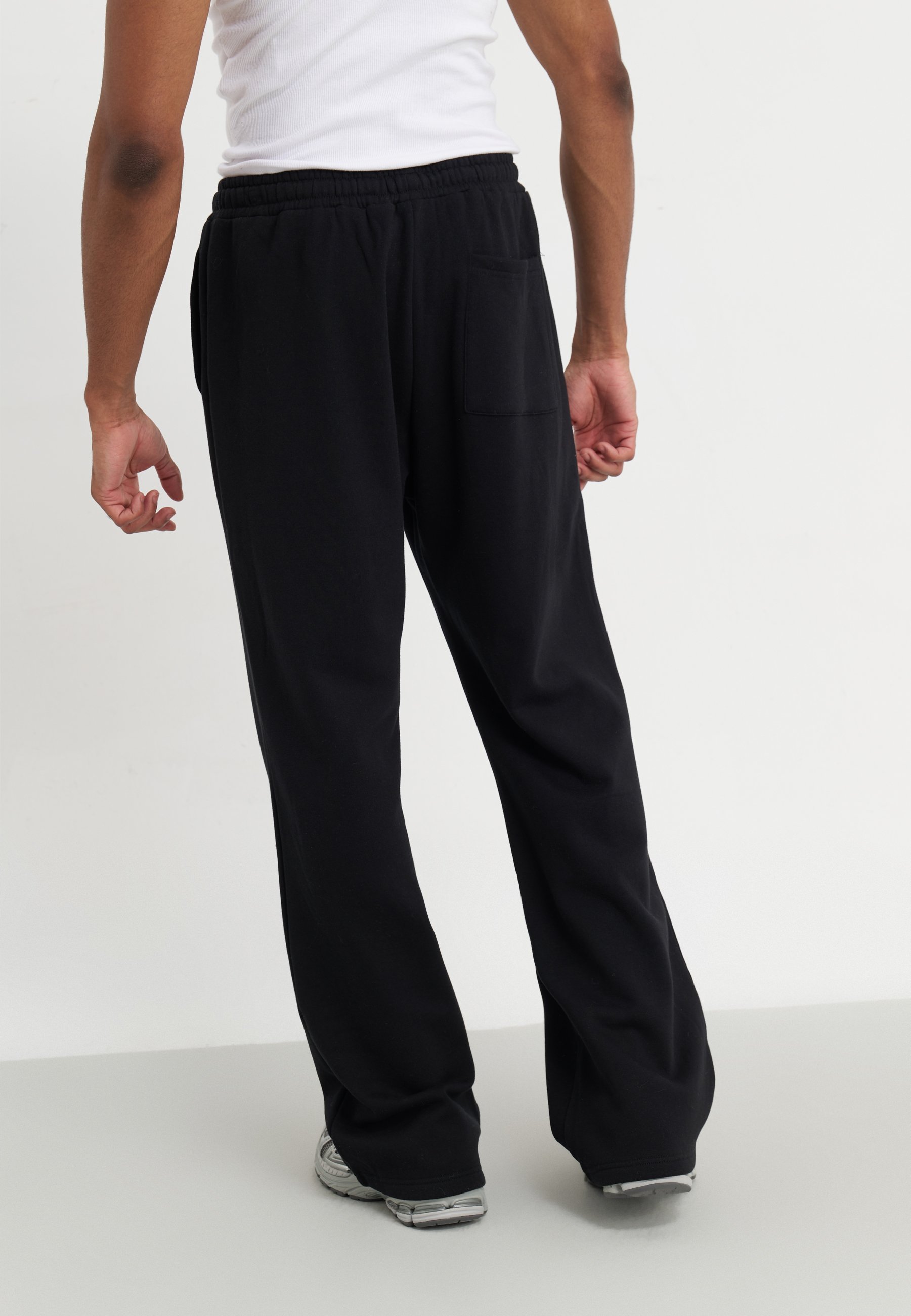 YOURTURN UNISEX - Pantaloni della tuta - neri