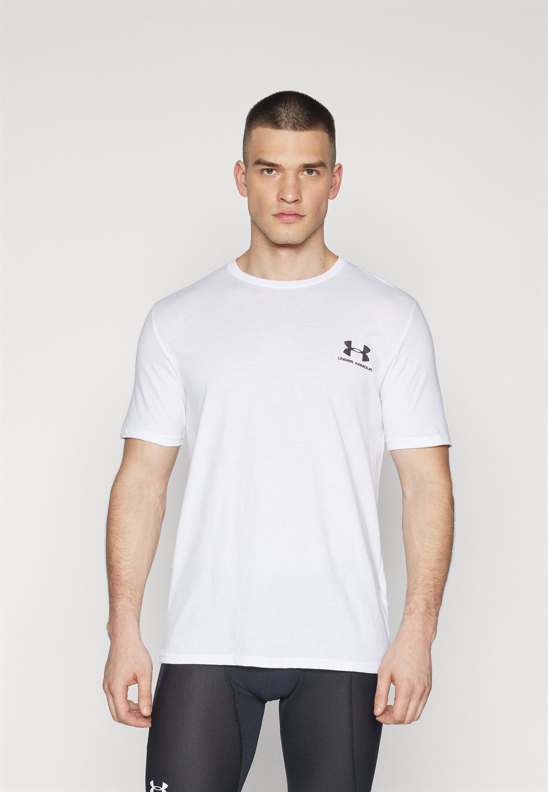 Maglietta Under Armour con logo stampato sul petto a sinistra - bianco/nero