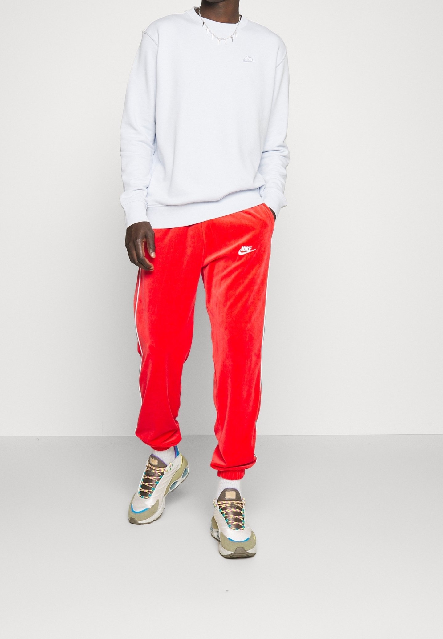 Spodnie dresowe Nike Sportswear - czerwone
