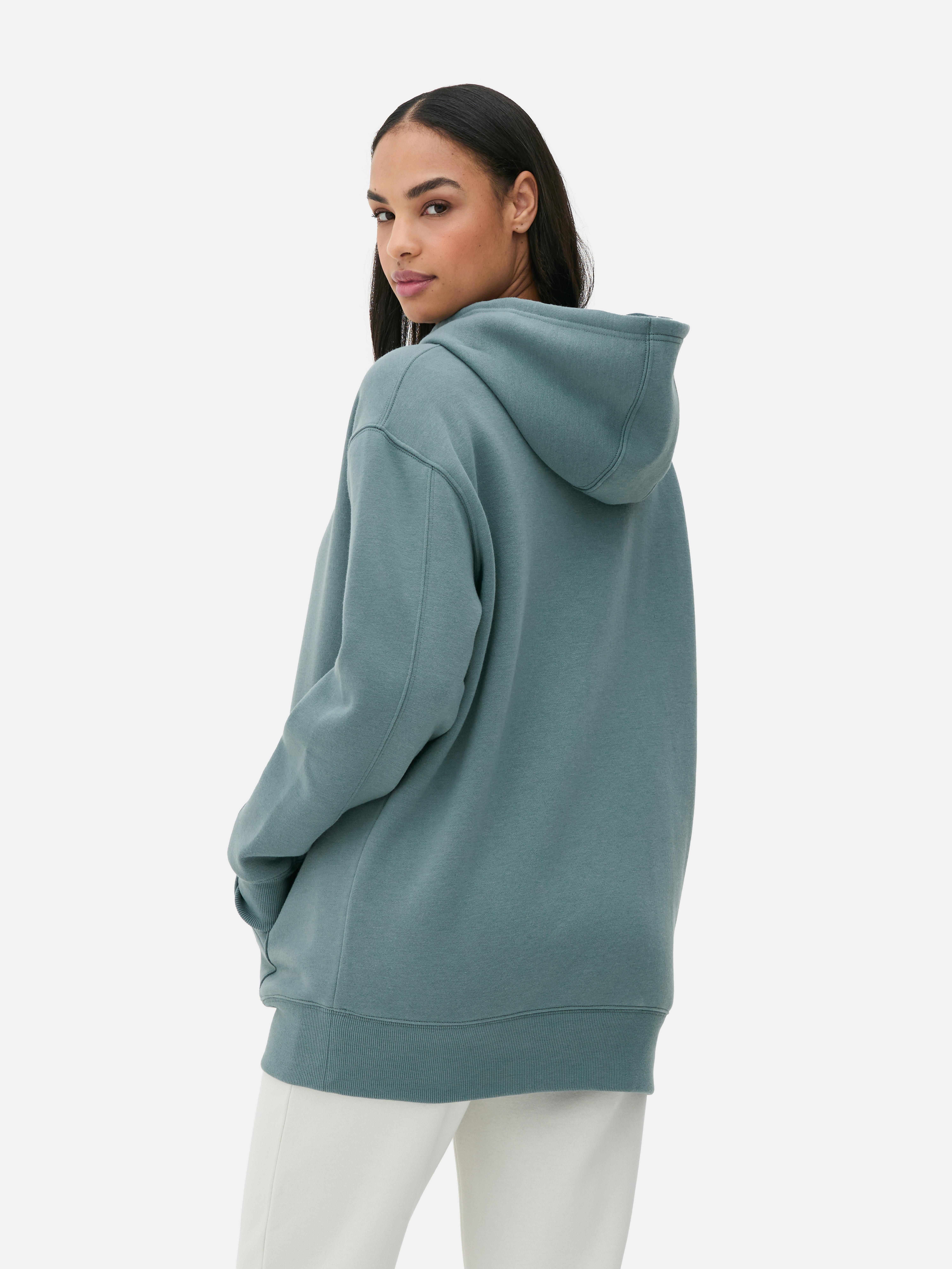 Κλασικό oversized φούτερ με κουκούλα Ένα casual oversized φούτερ με κορδόνι περίσφιξης και τσέπη καγκουρό