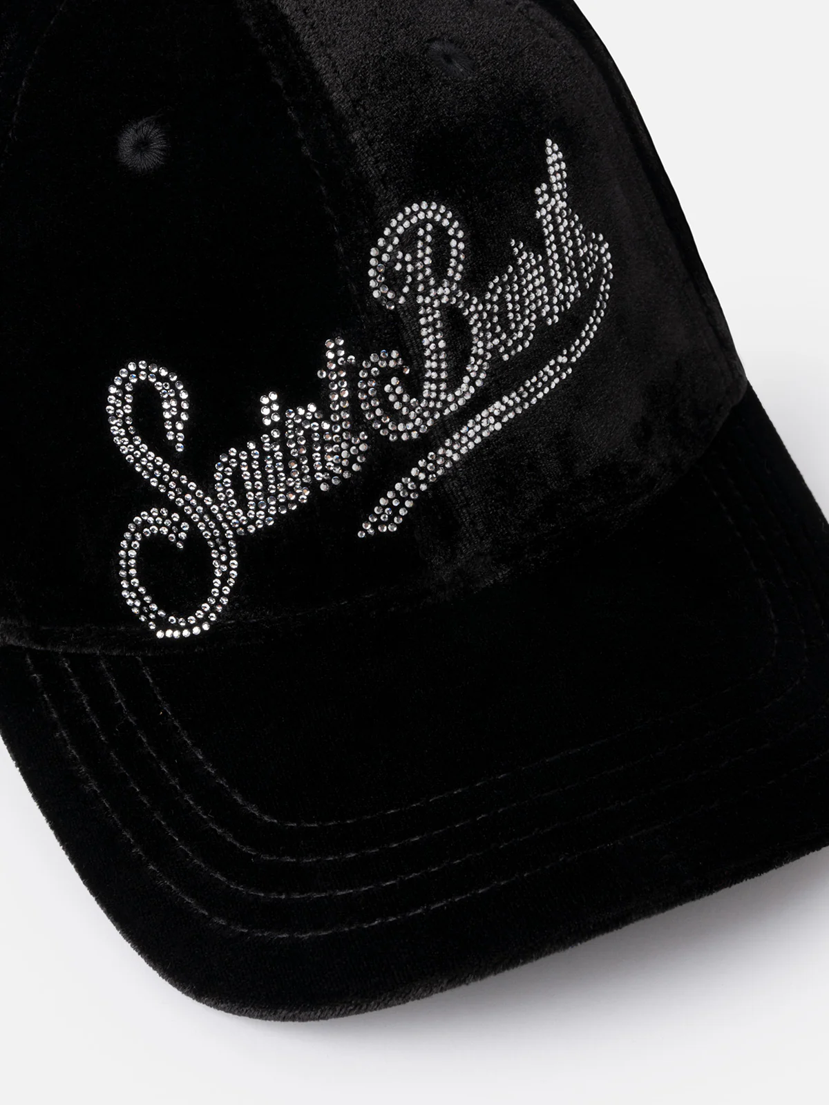 Zwarte fluwelen baseballpet met logo van strass-steentjes