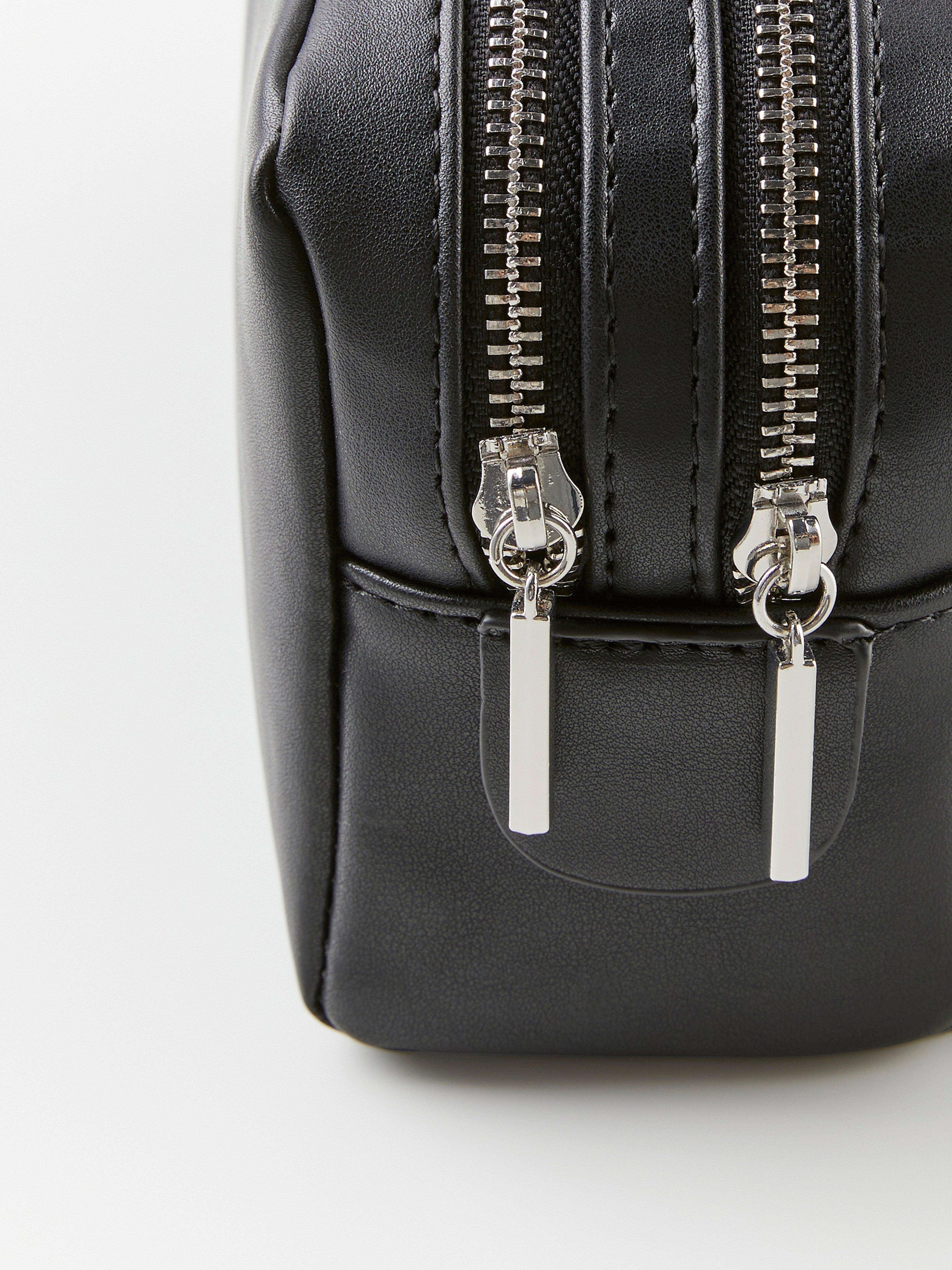 Necessaire de maquiagem preta