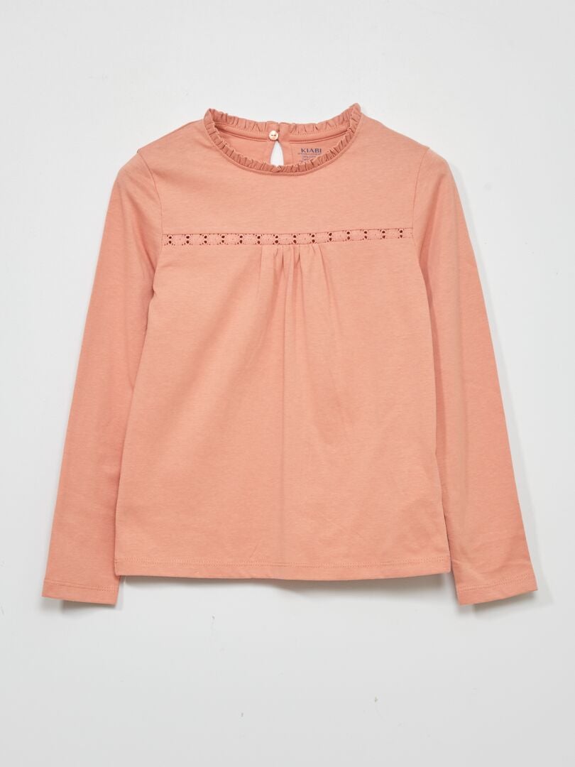 Camiseta rosa con mangas de encaje