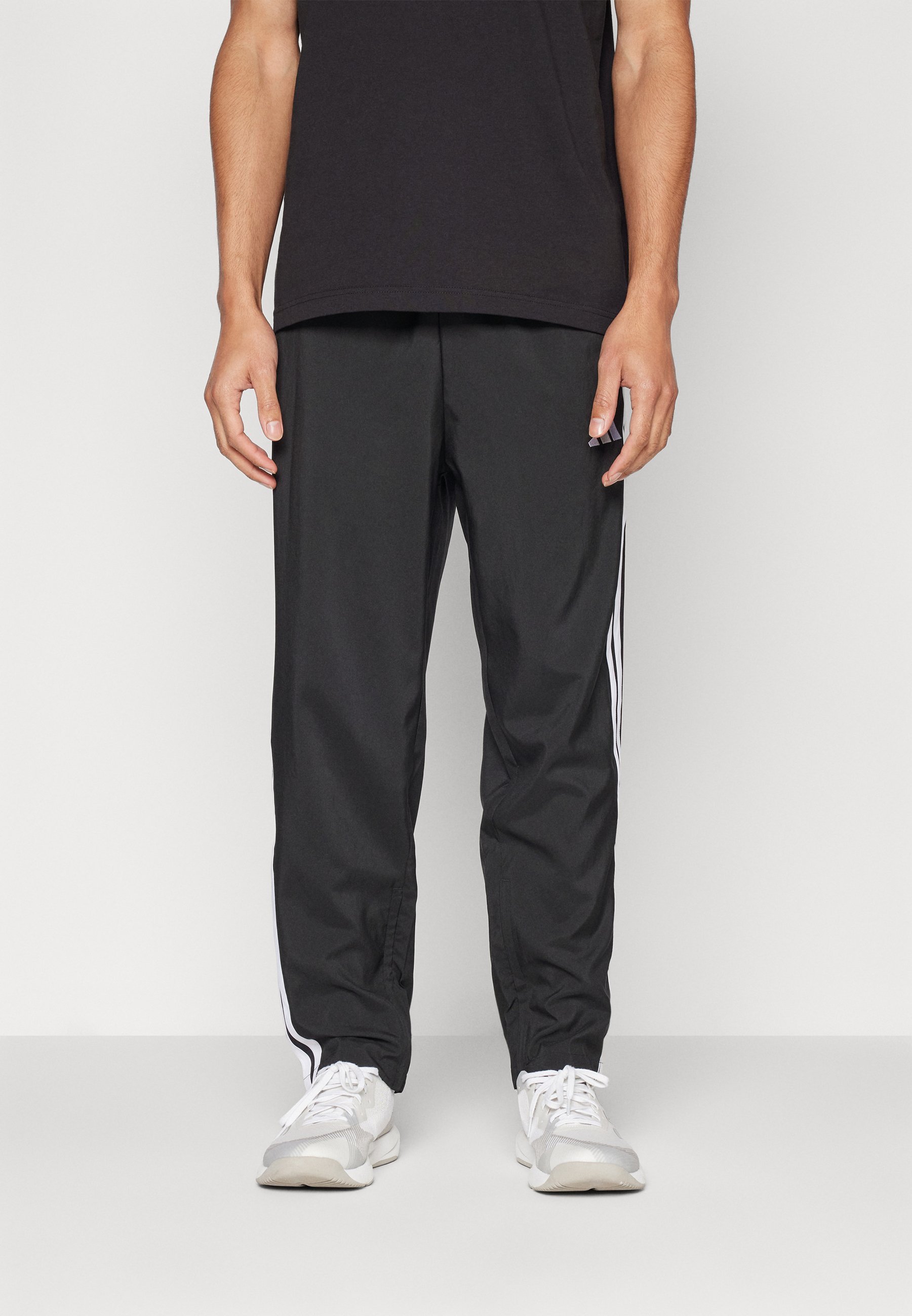 adidas Sportswear ESSENTIALS 3-STRIPES STANFORD OPEN HEM - Trainingsbroek - zwart/wit