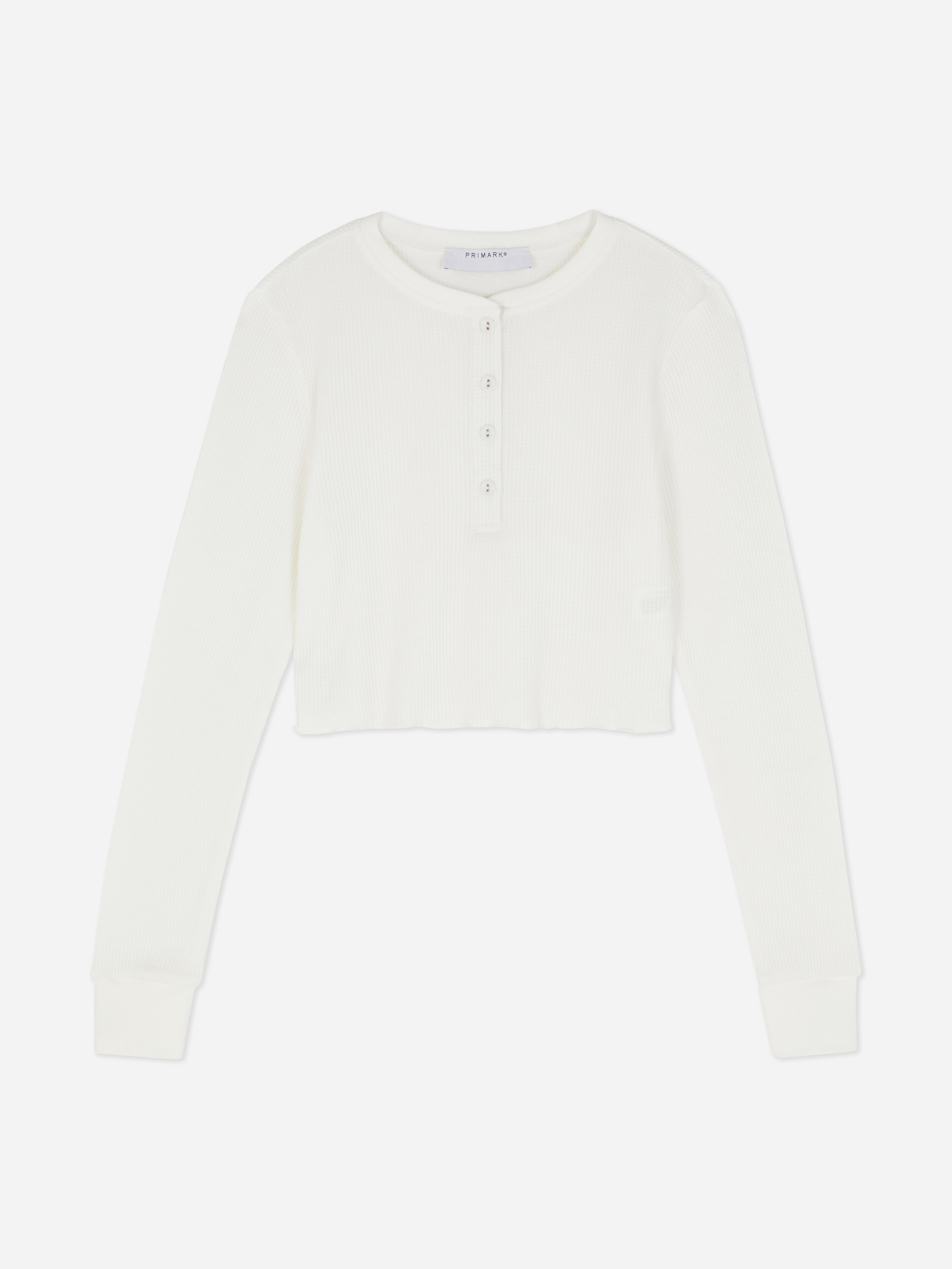 Κοντό τοπ Henley με υφή waffle Ένα κλασικό κοντό τοπ Henley με πατιλέτα με κουμπιά και υφή waffle