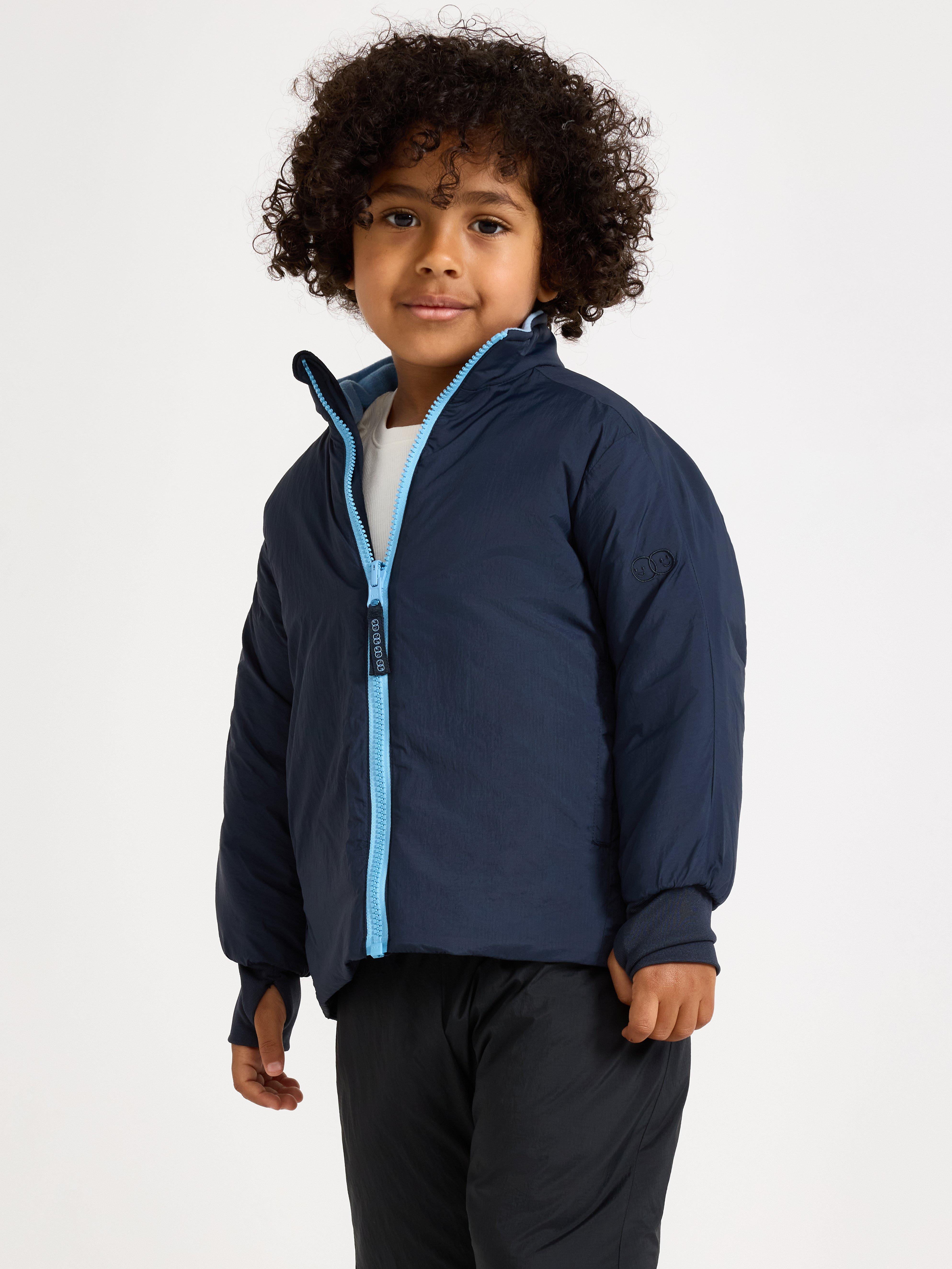 Chaqueta ligera acolchada e impermeable – Ropa deportiva infantil, color azul marino oscuro.