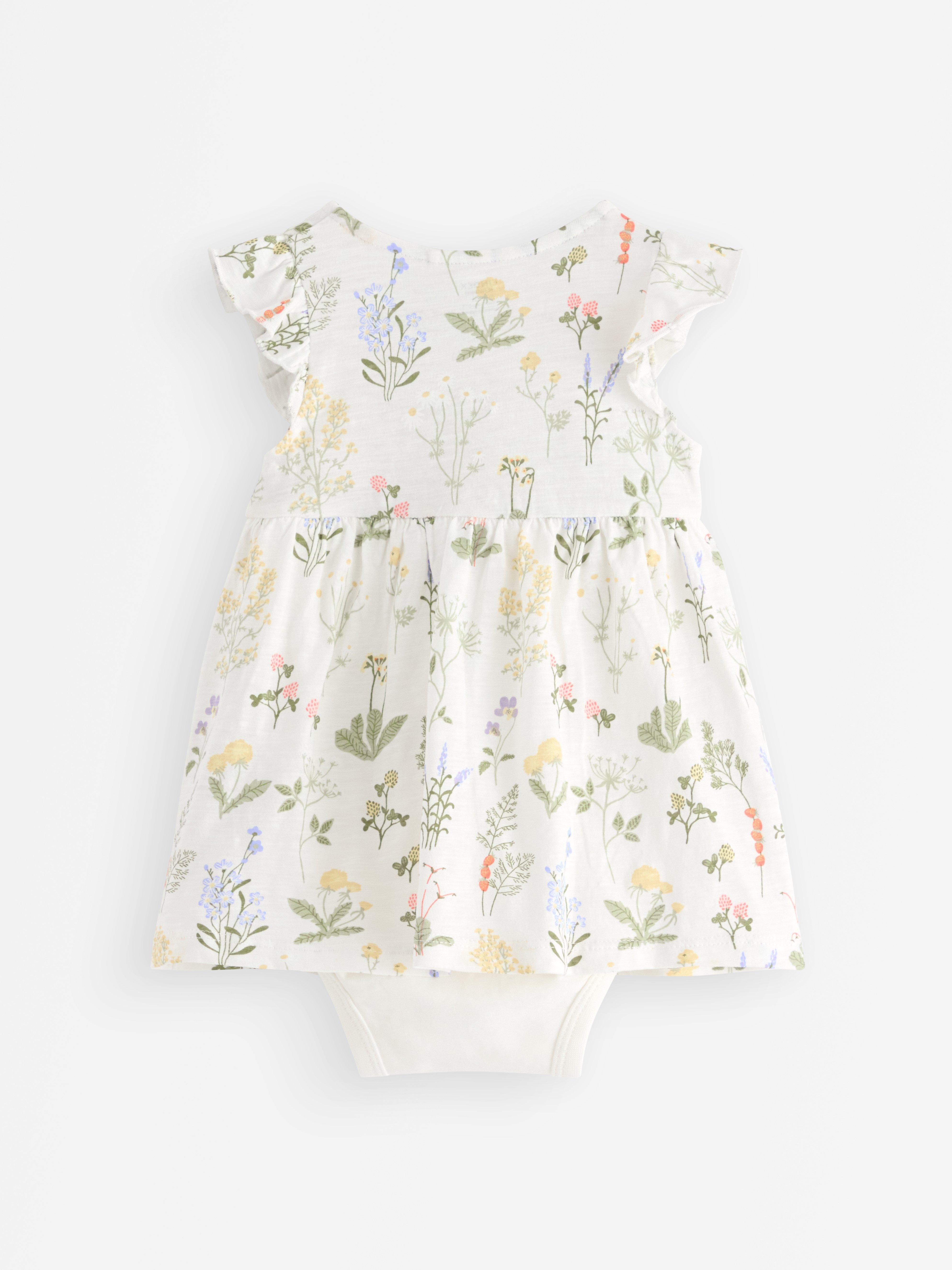 Vestido com corpete branco claro acinzentado