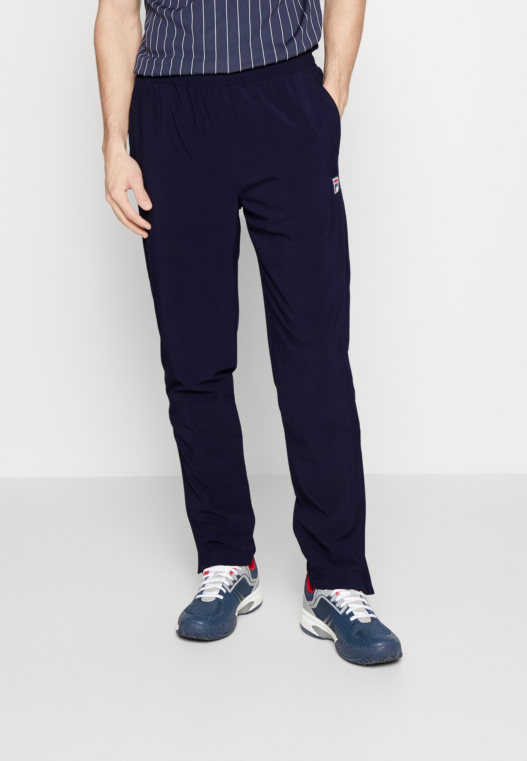 Fila PANTS PRO - Pantaloni da tuta - blu navy