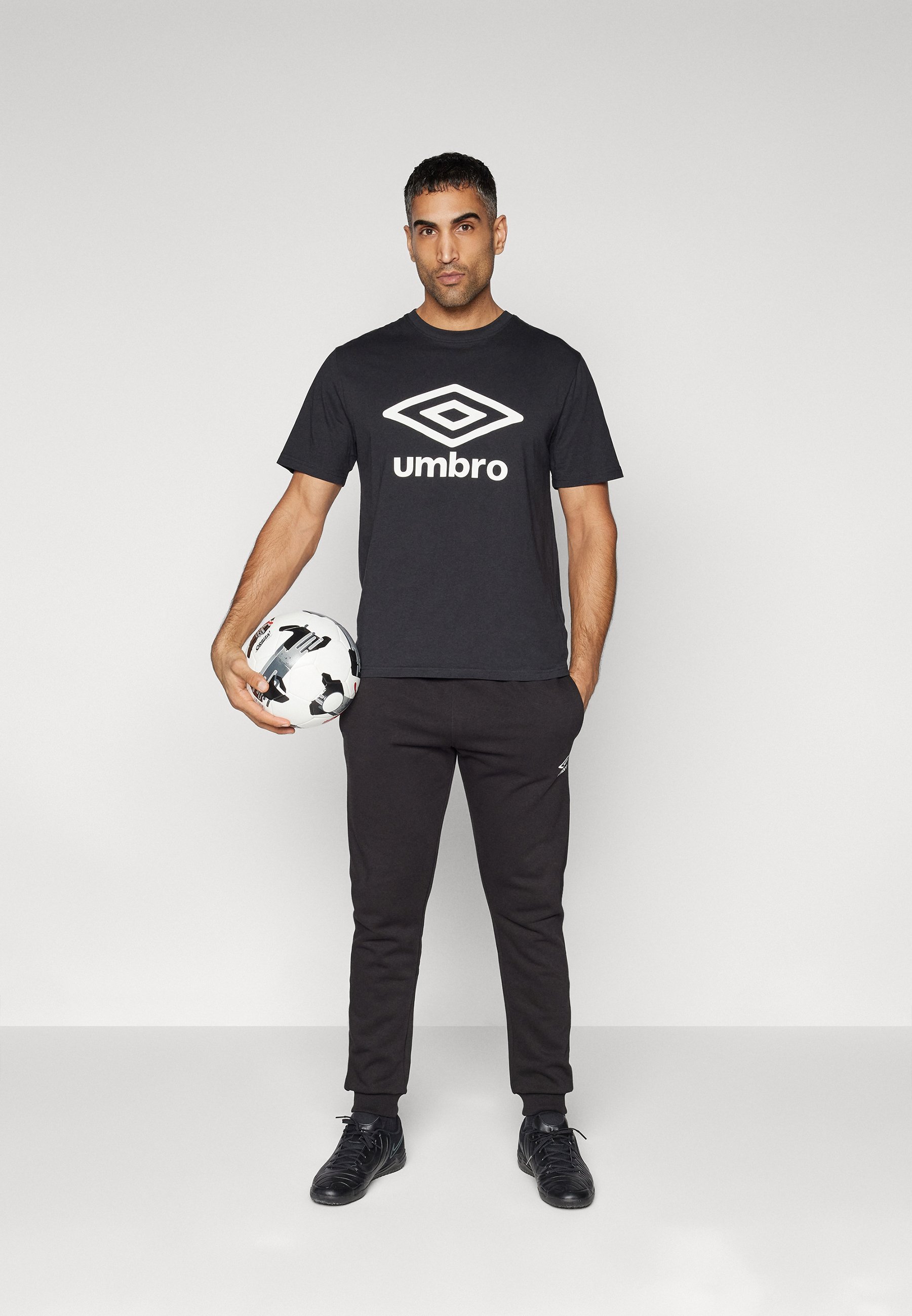 Pantaloni da jogging Umbro TEAM SKINNY - Pantaloni della tuta - nero/bianco