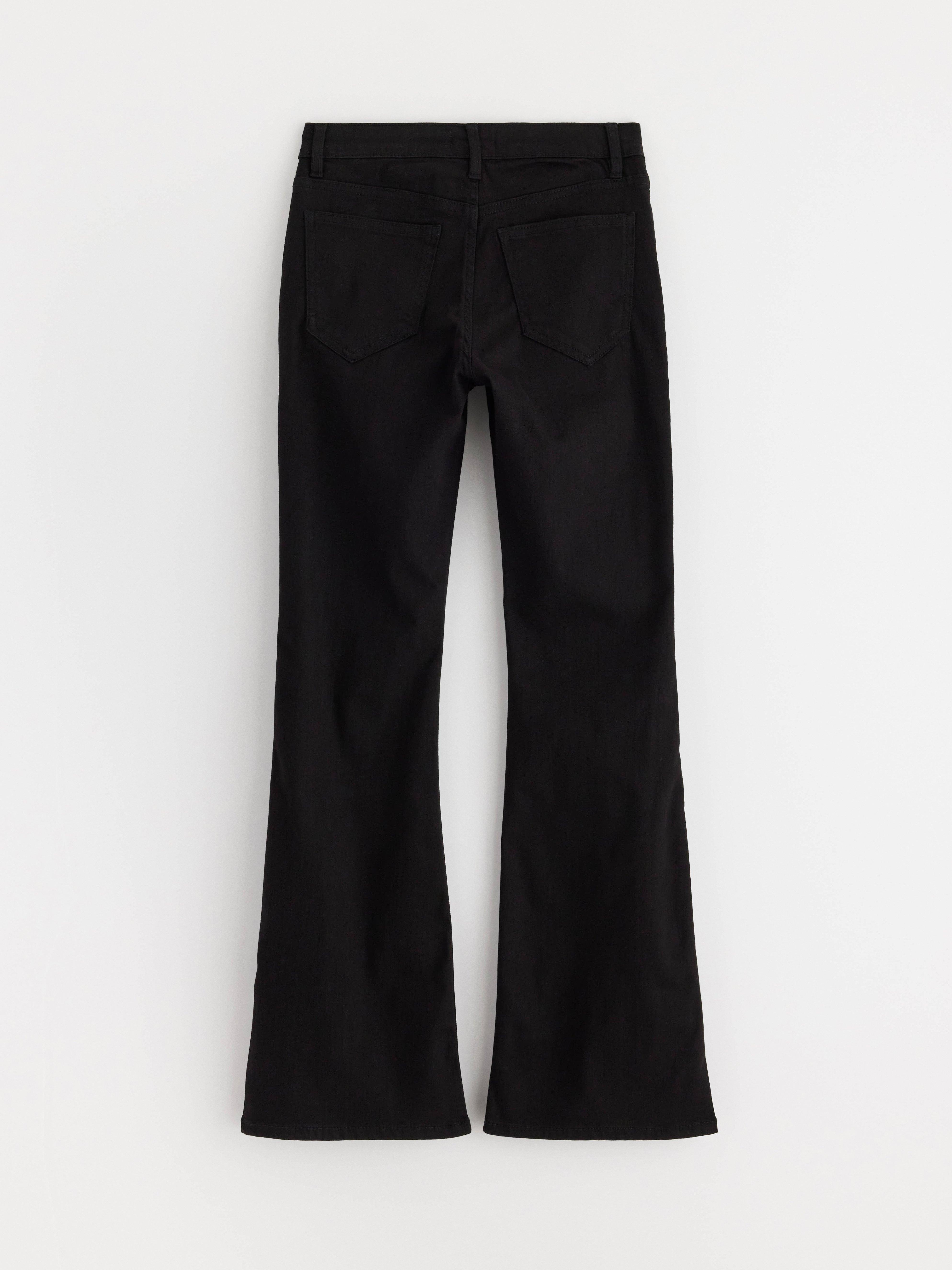 Pantalones vaqueros acampanados FREJA, súper elásticos, cintura normal, color negro.