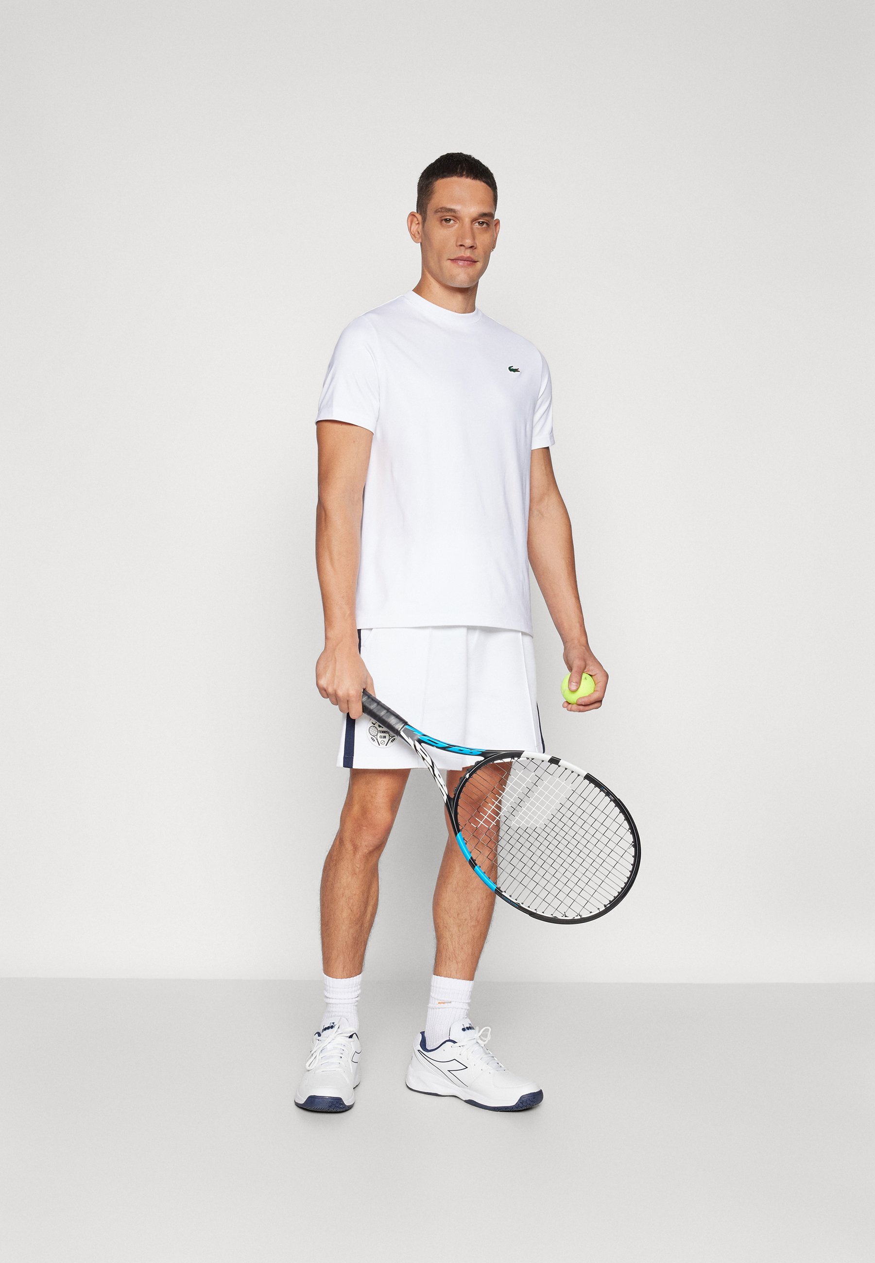 Pantaloncini sportivi Lacoste Sport SHORT HERITAGE - bianco/blu navy