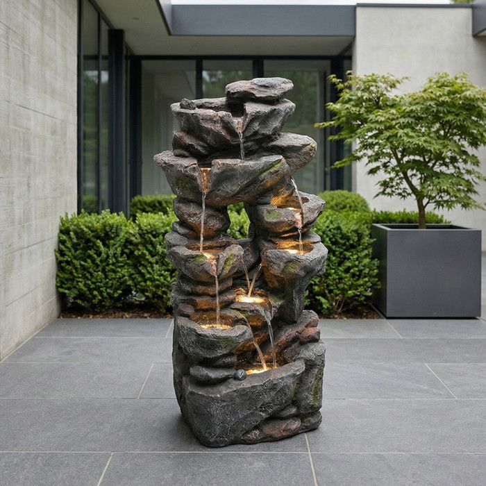 Fuente de jardín con iluminación LED - Aspecto de piedra natural - Bomba de agua integrada - Iluminación LED - 46x36x90 cm