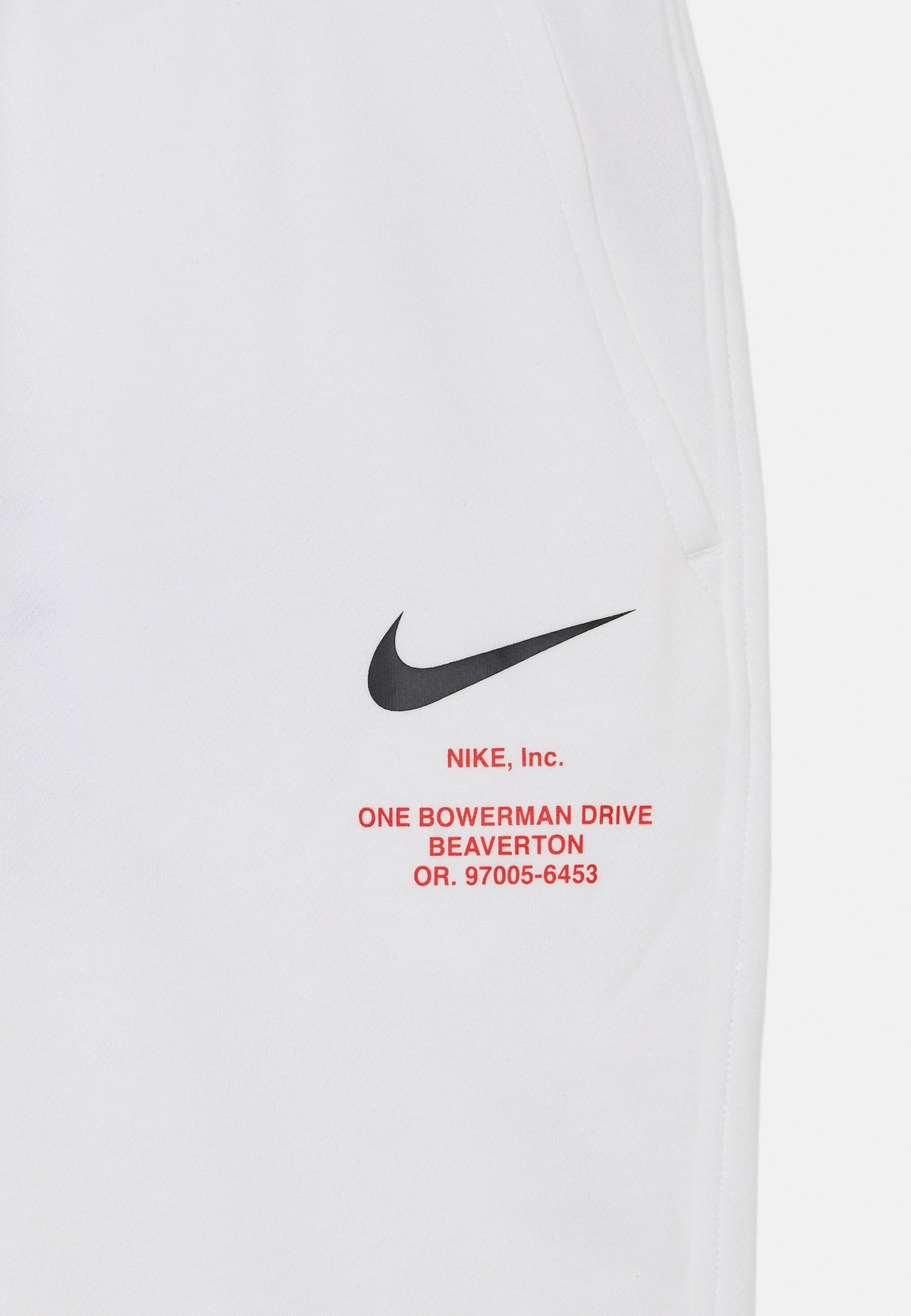 Nike Sportswear trainingsbroek - wit/zwart