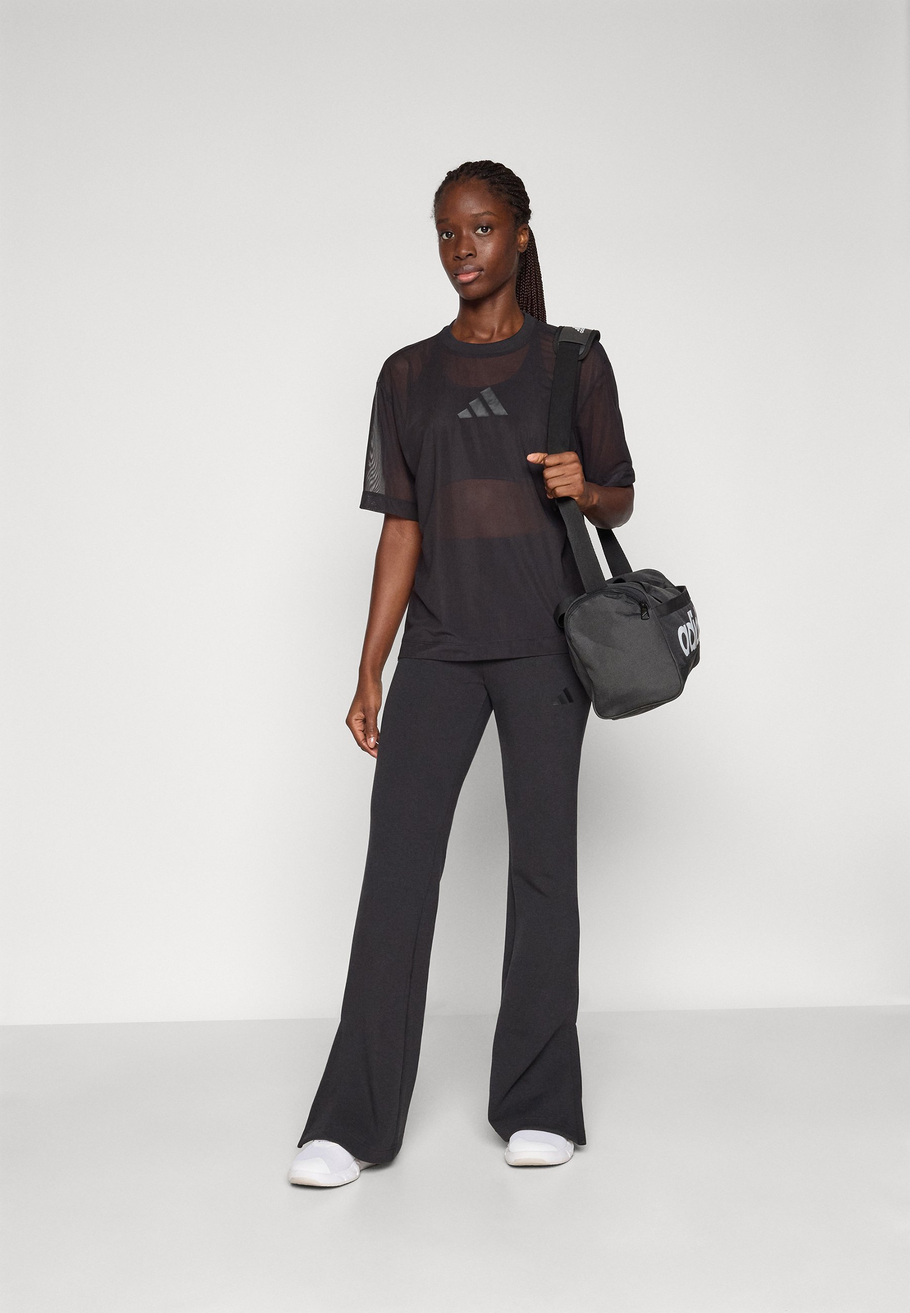 adidas Sportswear SOFT LUX FLARED PANTS - Leggings - zwart