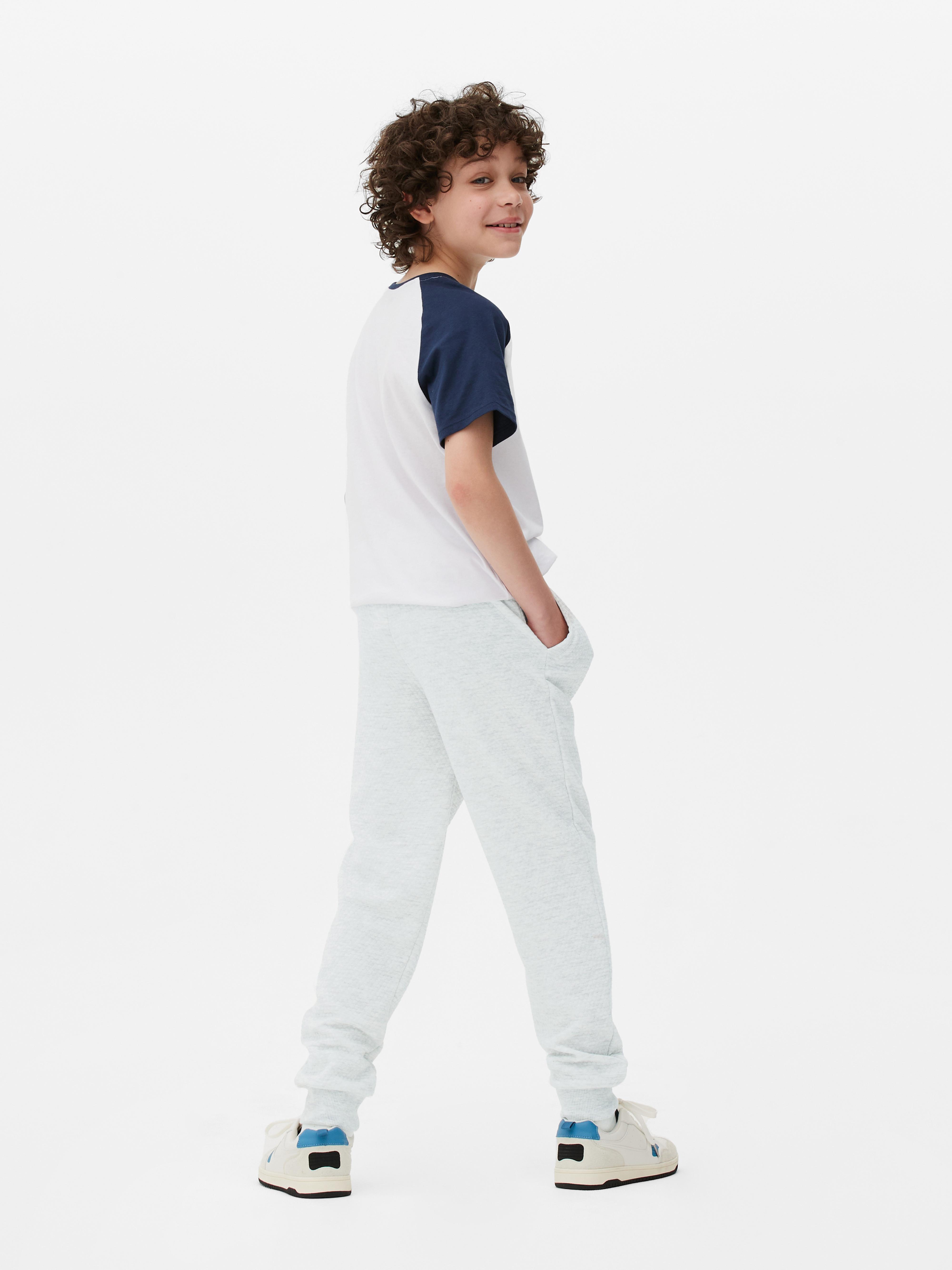 Pantalon de survêtement texturé. Ce pantalon de survêtement correspond parfaitement à leur style.