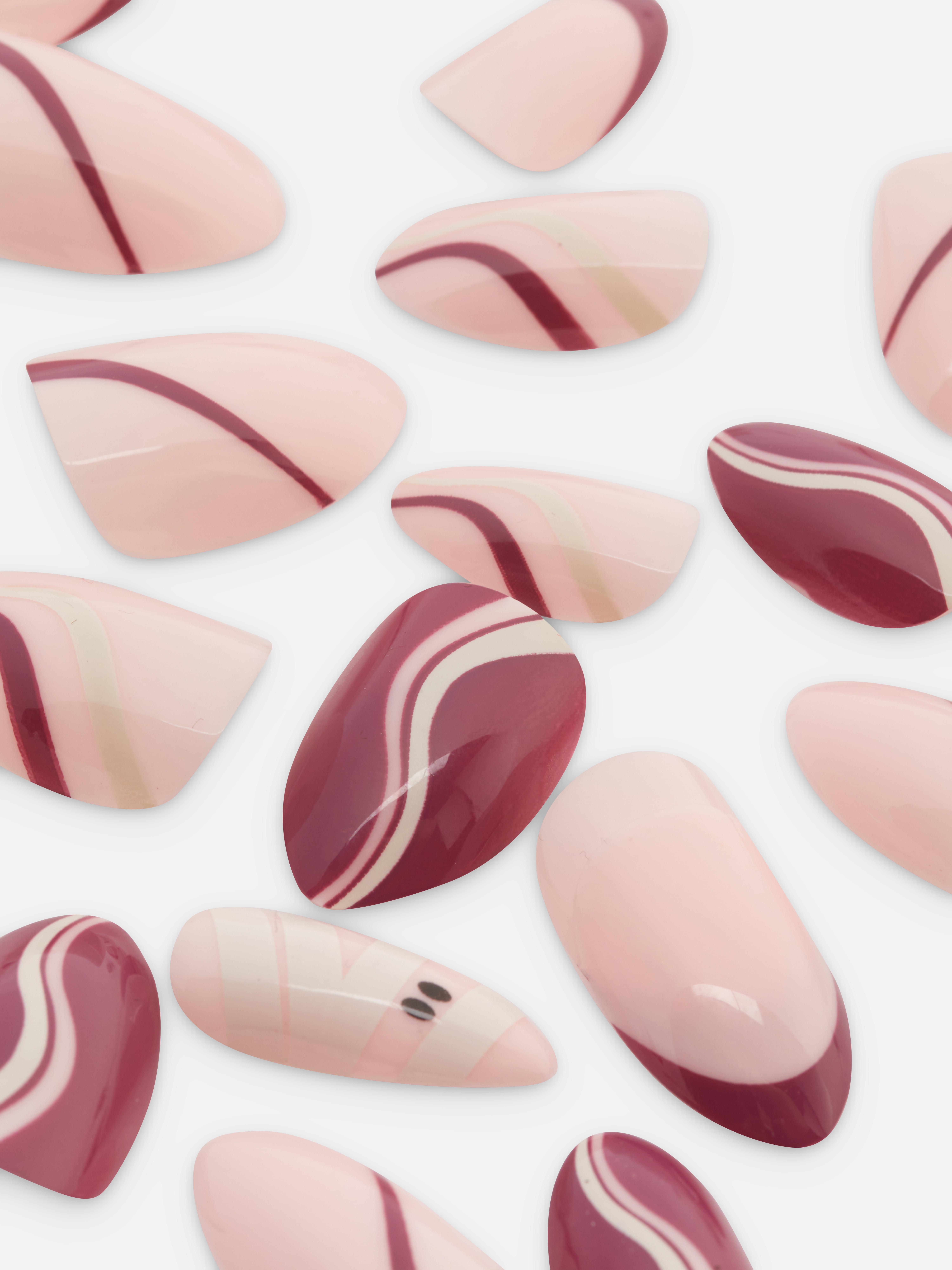 PS... Unghii artificiale lucioase în formă de migdală cu modele spiralate Un set de unghii artificiale în formă de migdală cu modele lucioase și colorate în formă de spirală