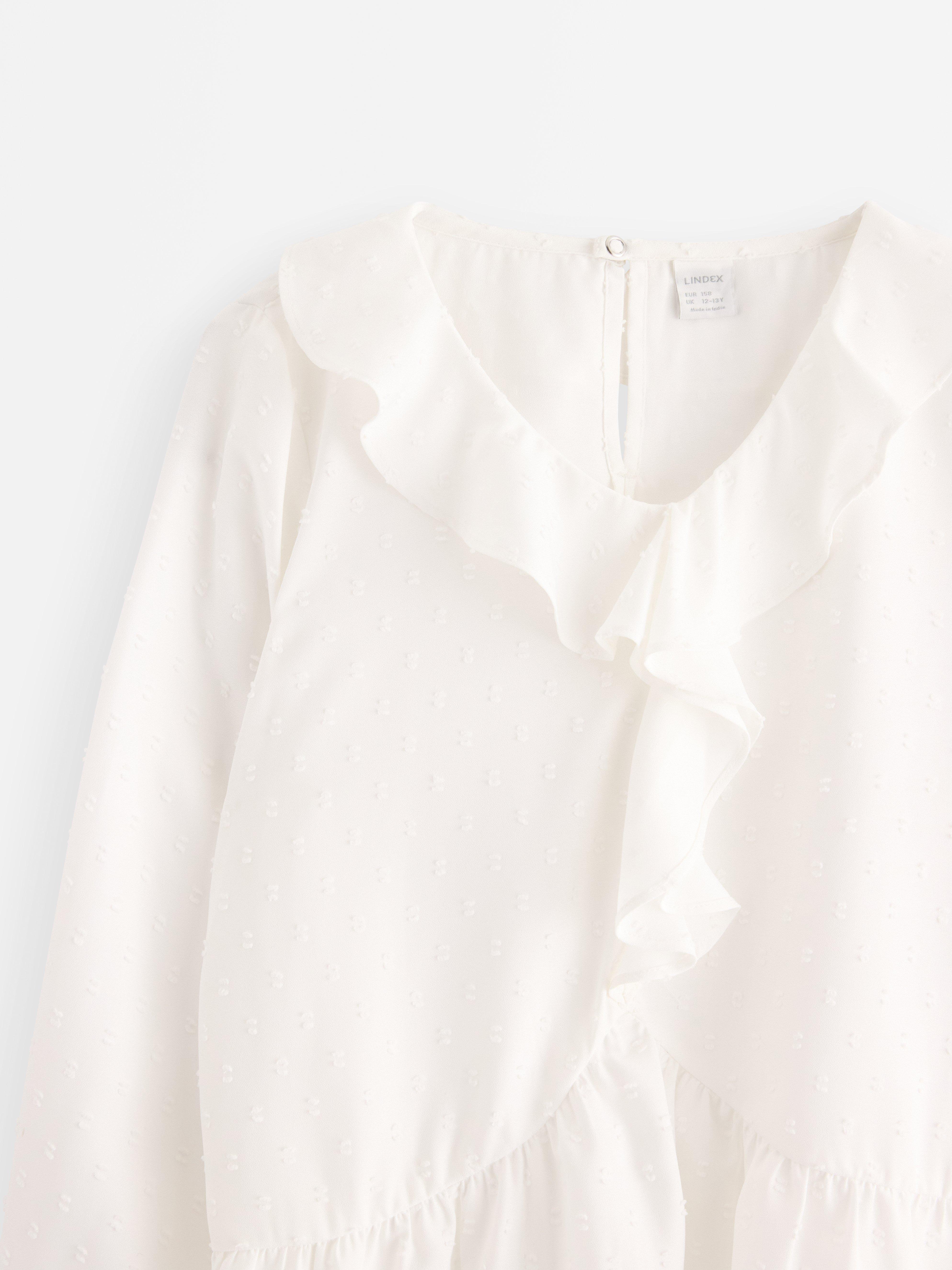 Blusa de manga larga color blanco roto
