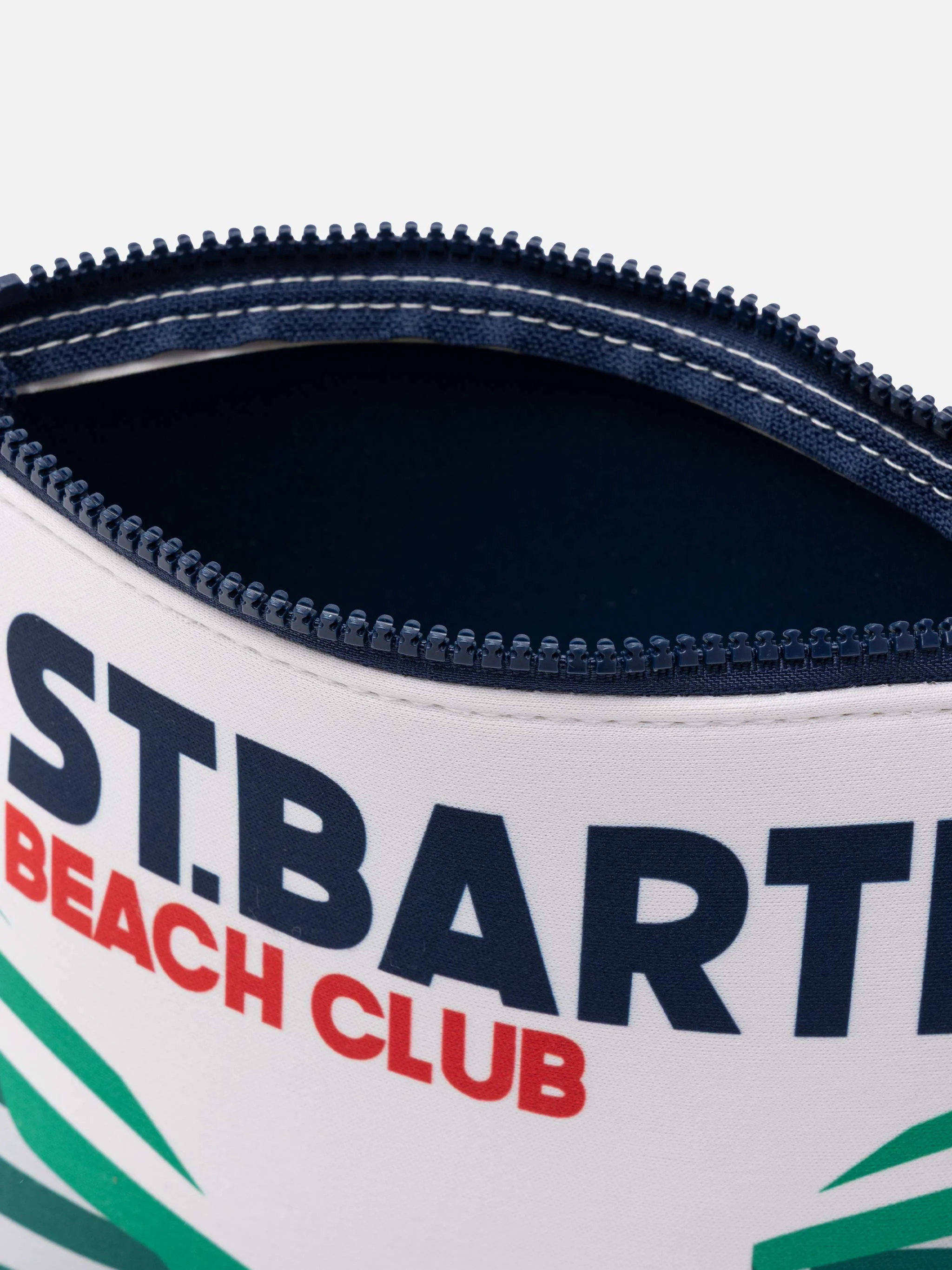 Aline scuba clutch tas met print van een ansichtkaart van Saint Barth