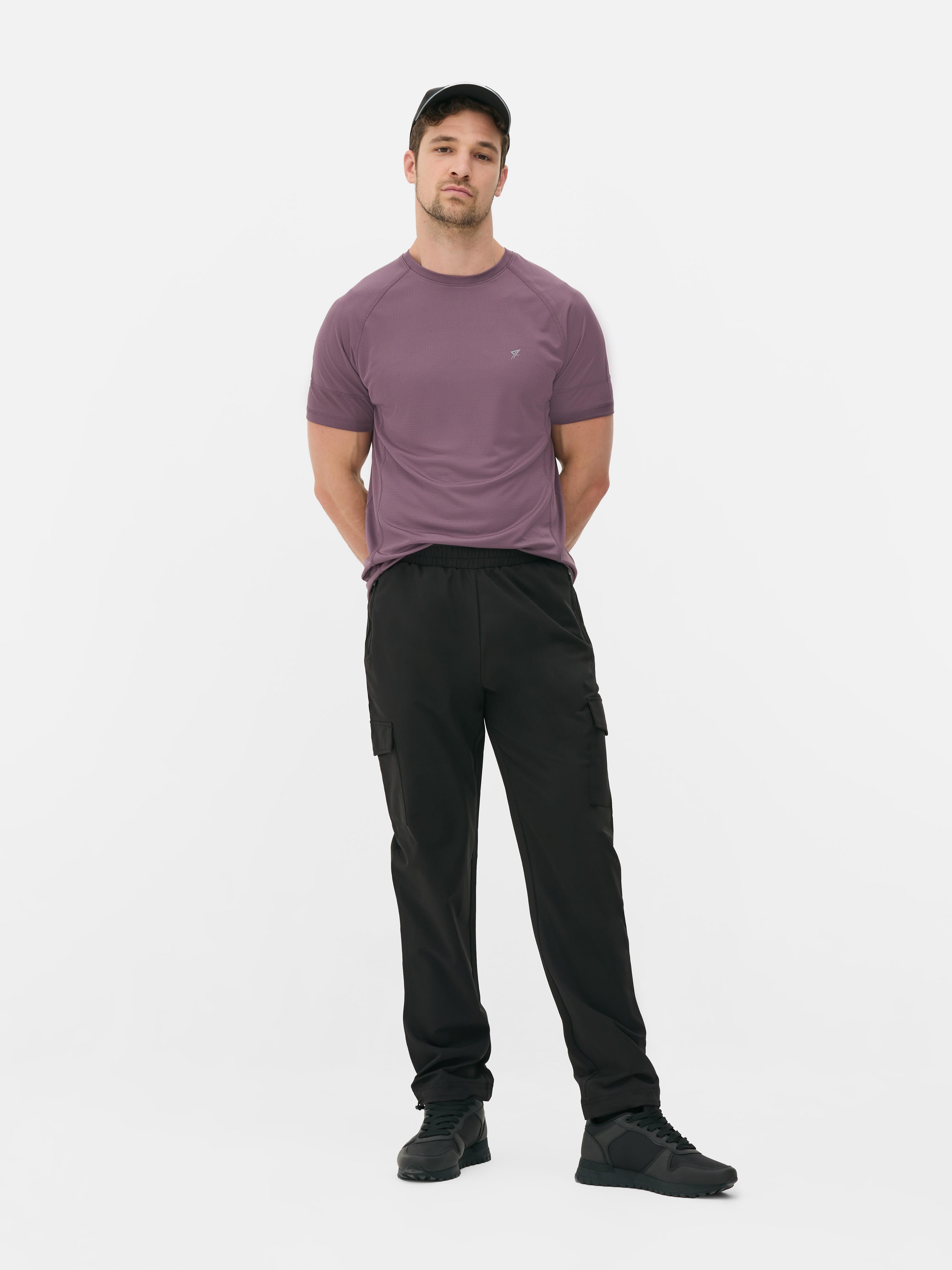 Woven cargo sweatpants Woven sweatpants with stretchy waist, cargo pockets and adjustable ankle cuffs