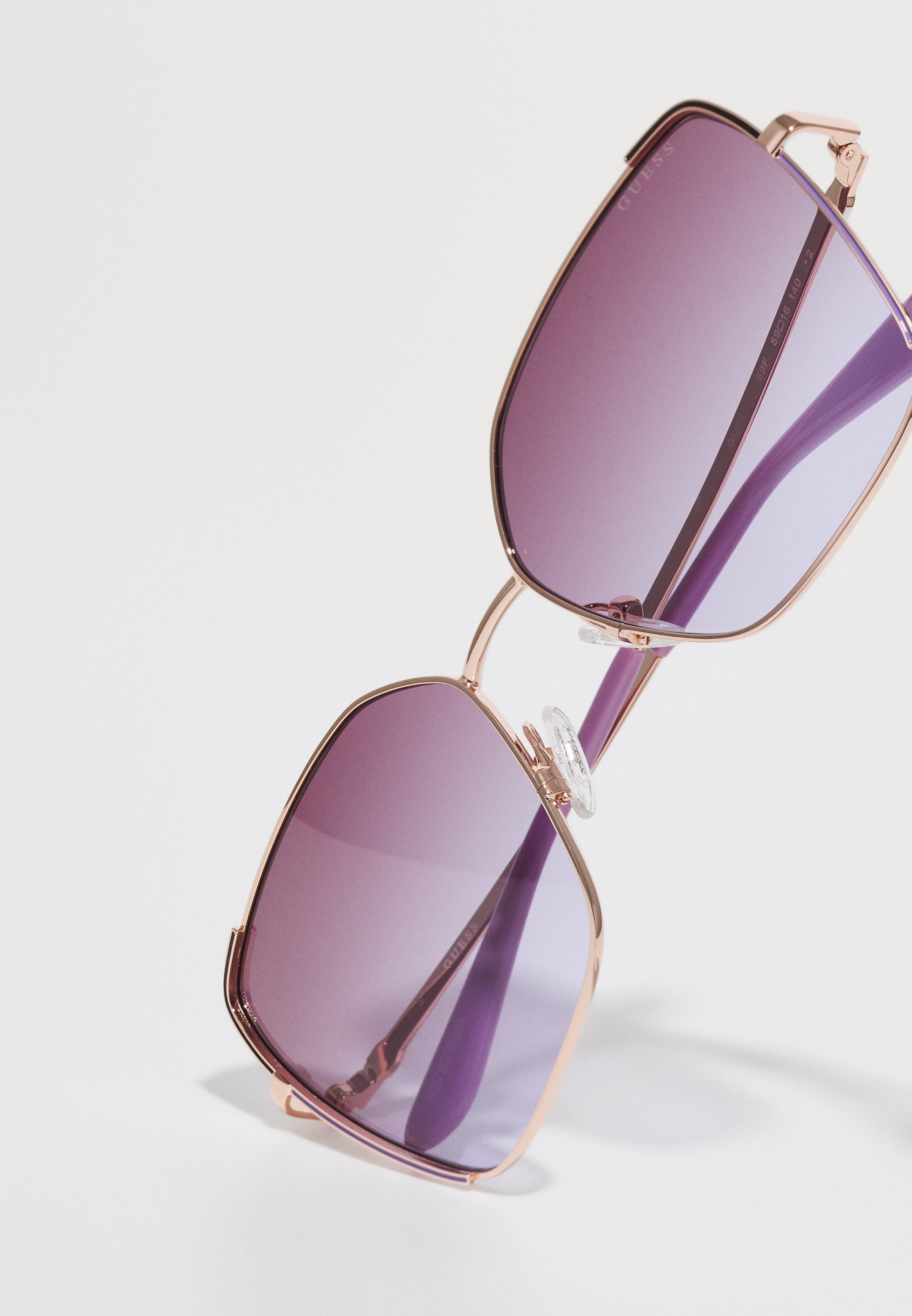 Lunettes de soleil Guess - beige/marron