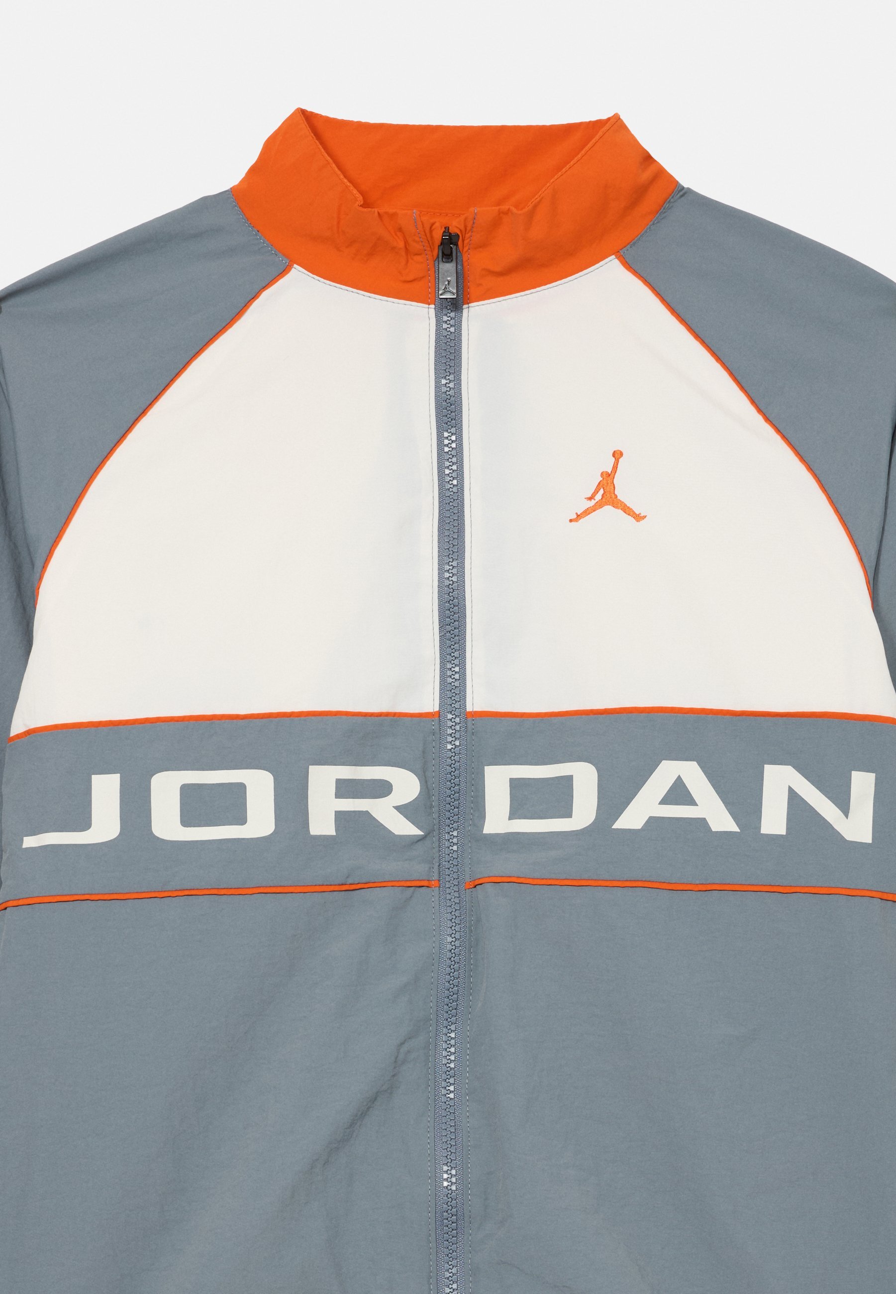 Ensemble coupe-vent unisexe Jordan avec passepoil - Gris clair