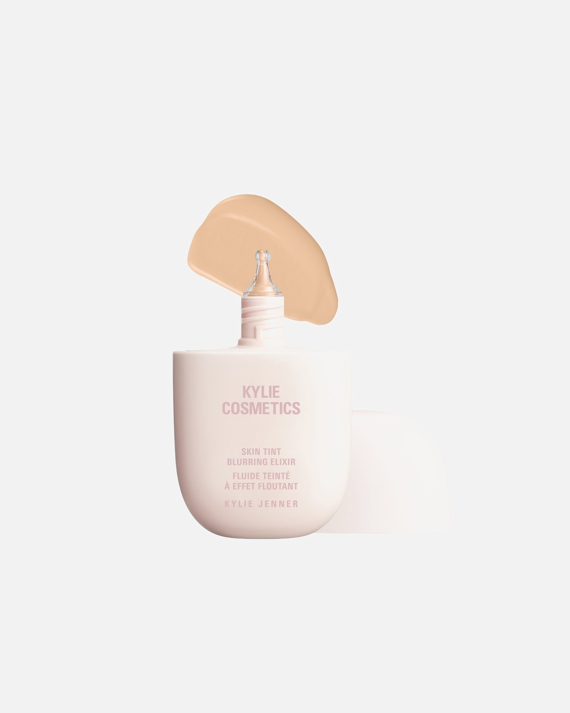 KYLIE COSMETICS makiažo pagrindas „Kylie Cosmetics Skin Tint Blurring Elixir“ makiažo pagrindas – 2.5N, 30 ml – 30 ml