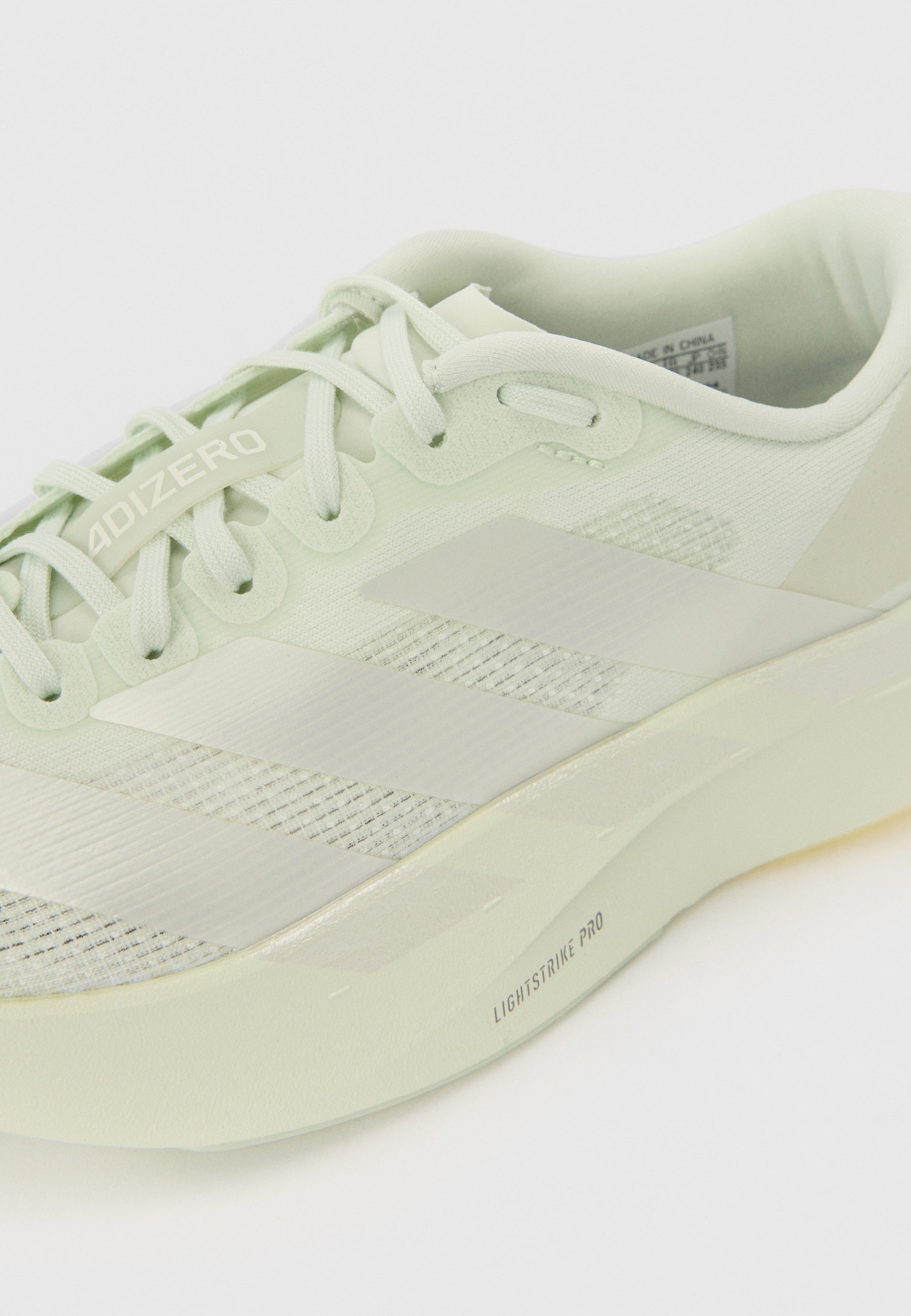 adidas Performance ADIZERO EVO SL W - Chaussures de running sur route - cryjad/zeromt/lingrn