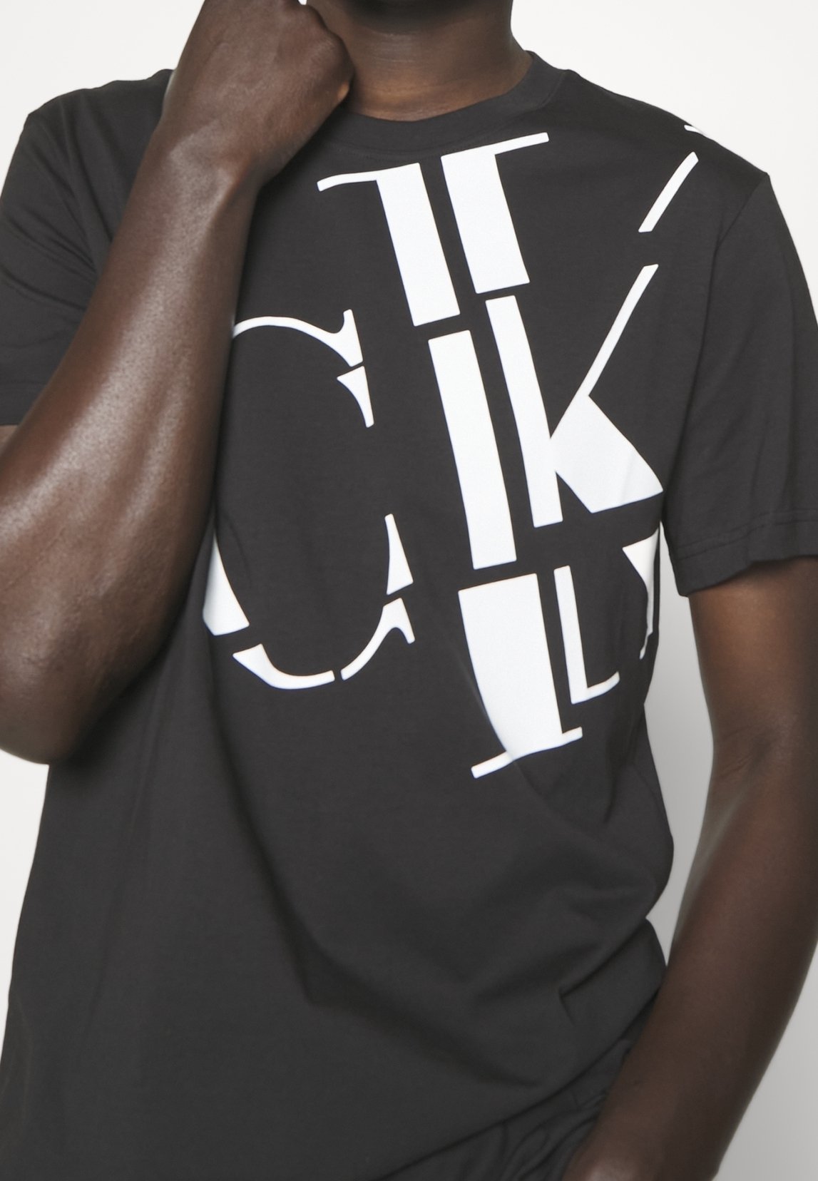 Camiseta Calvin Klein Jeans com estampa - preta