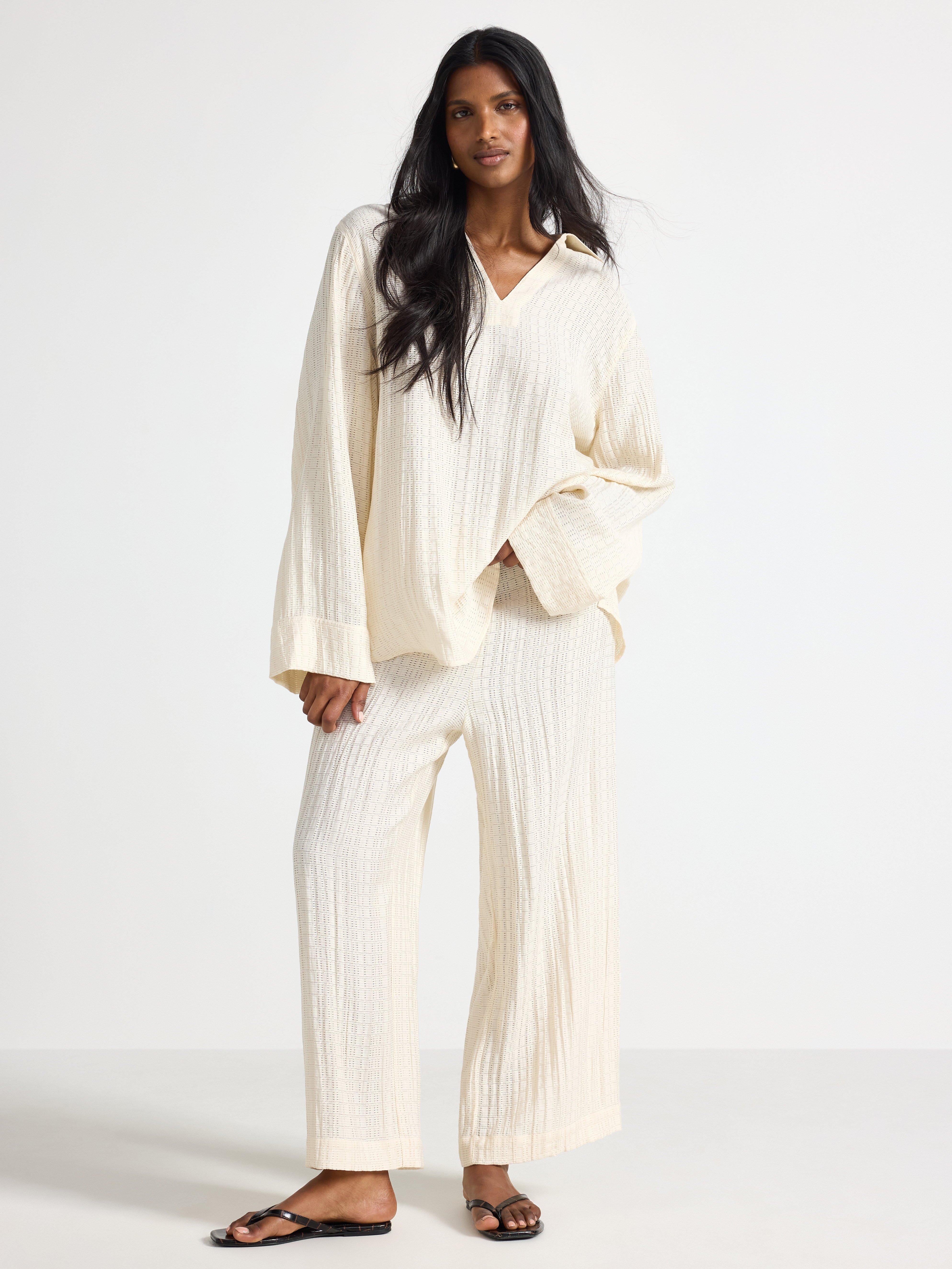 LYKKE Los pantalones anchos Blanco roto