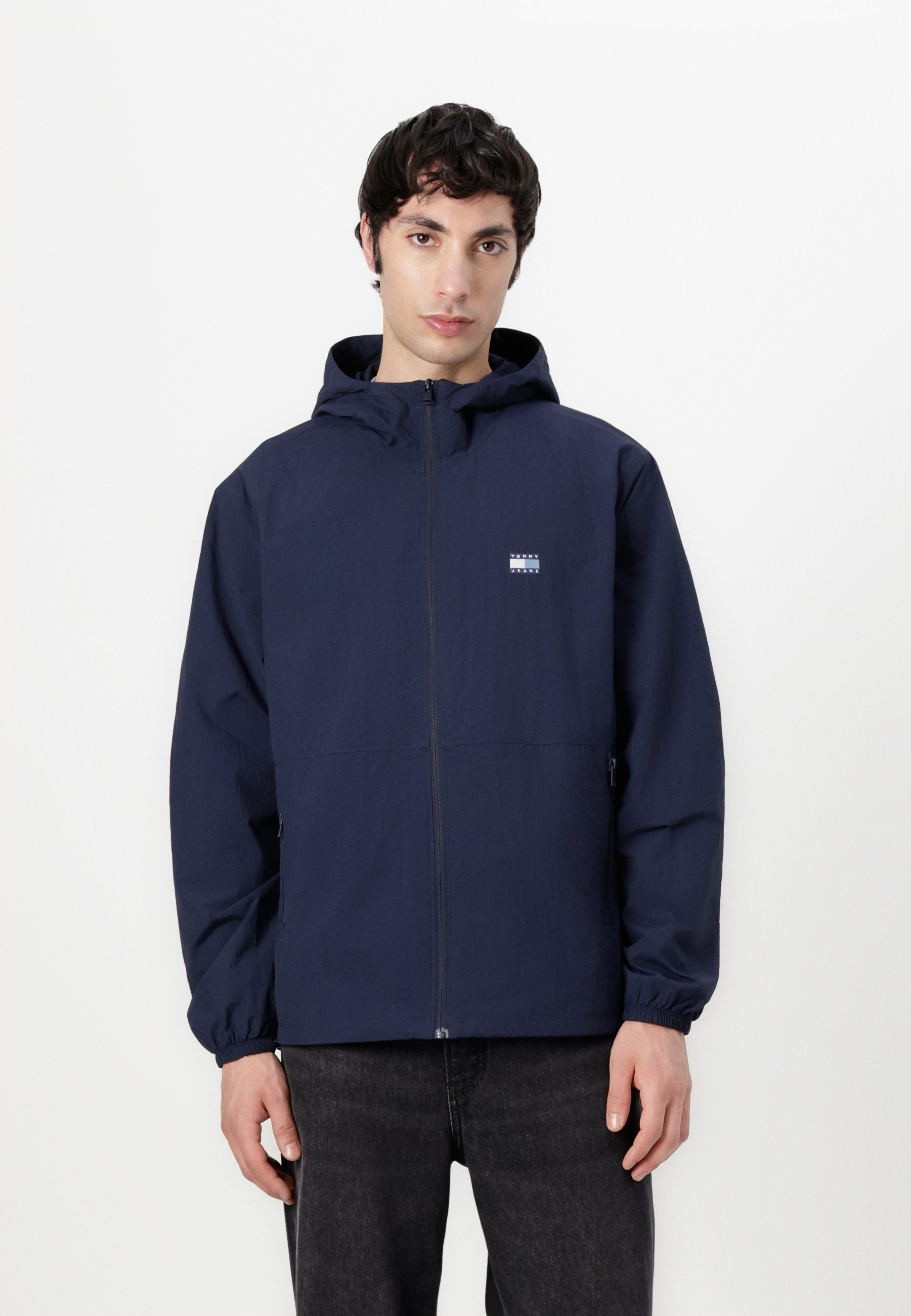 Tommy Jeans CHICAGO WINDBREAKER - Zomerjas - donker marineblauw