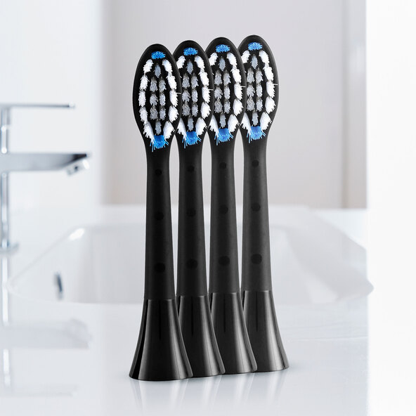 Replacement toothbrush heads, black (medium), set of 4