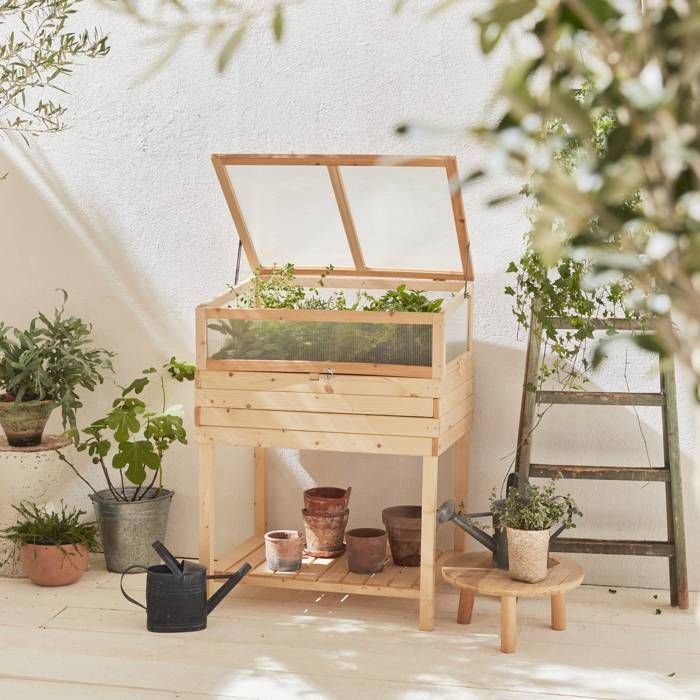 Raised garden bed on spruce wood legs with maple greenhouse