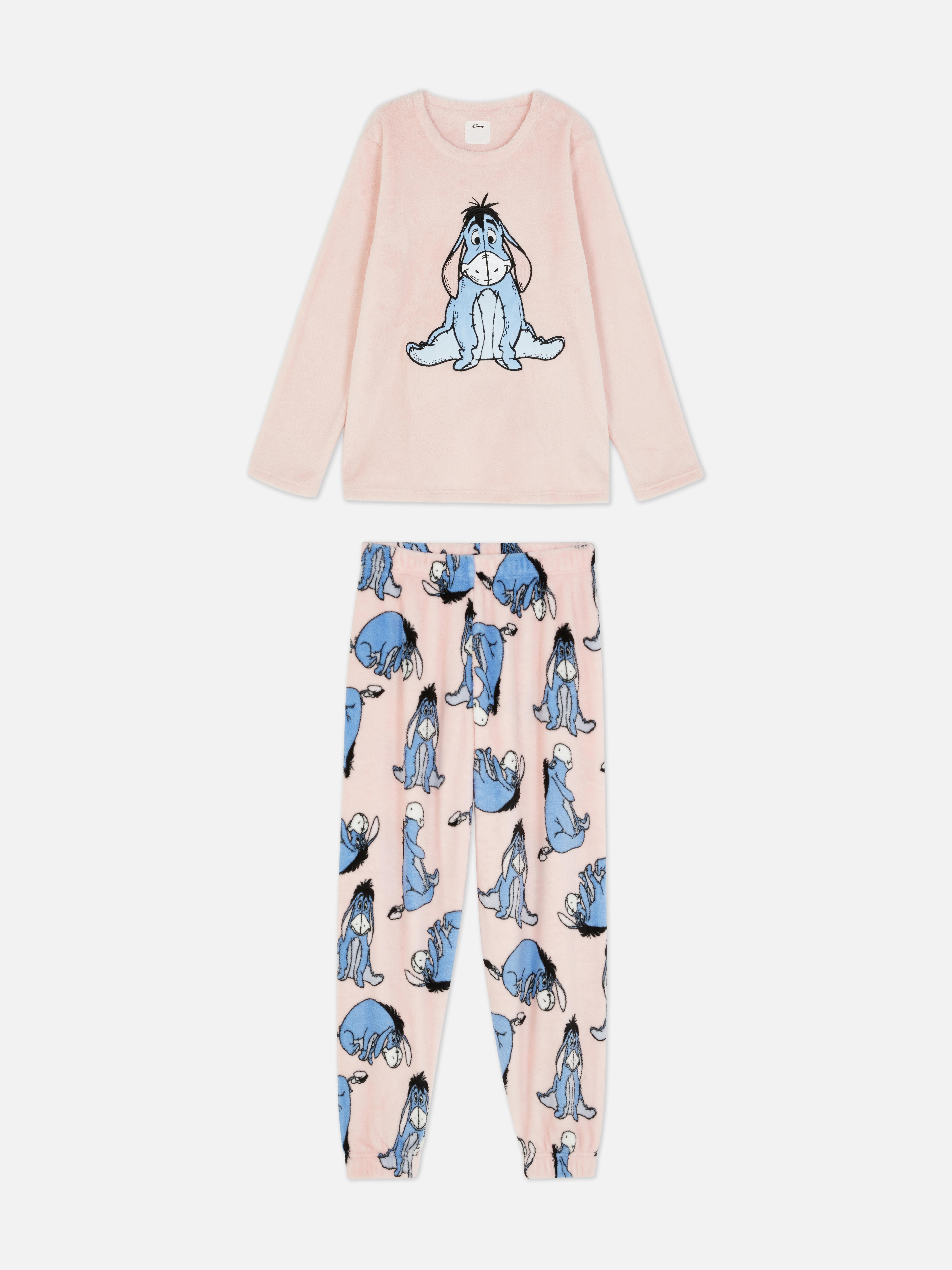 Pijamale Disney cu mânecă lungă din fleece Un set de pijamale Disney din două piese, cu un top cu mânecă lungă și pantaloni de trening în stil jogging