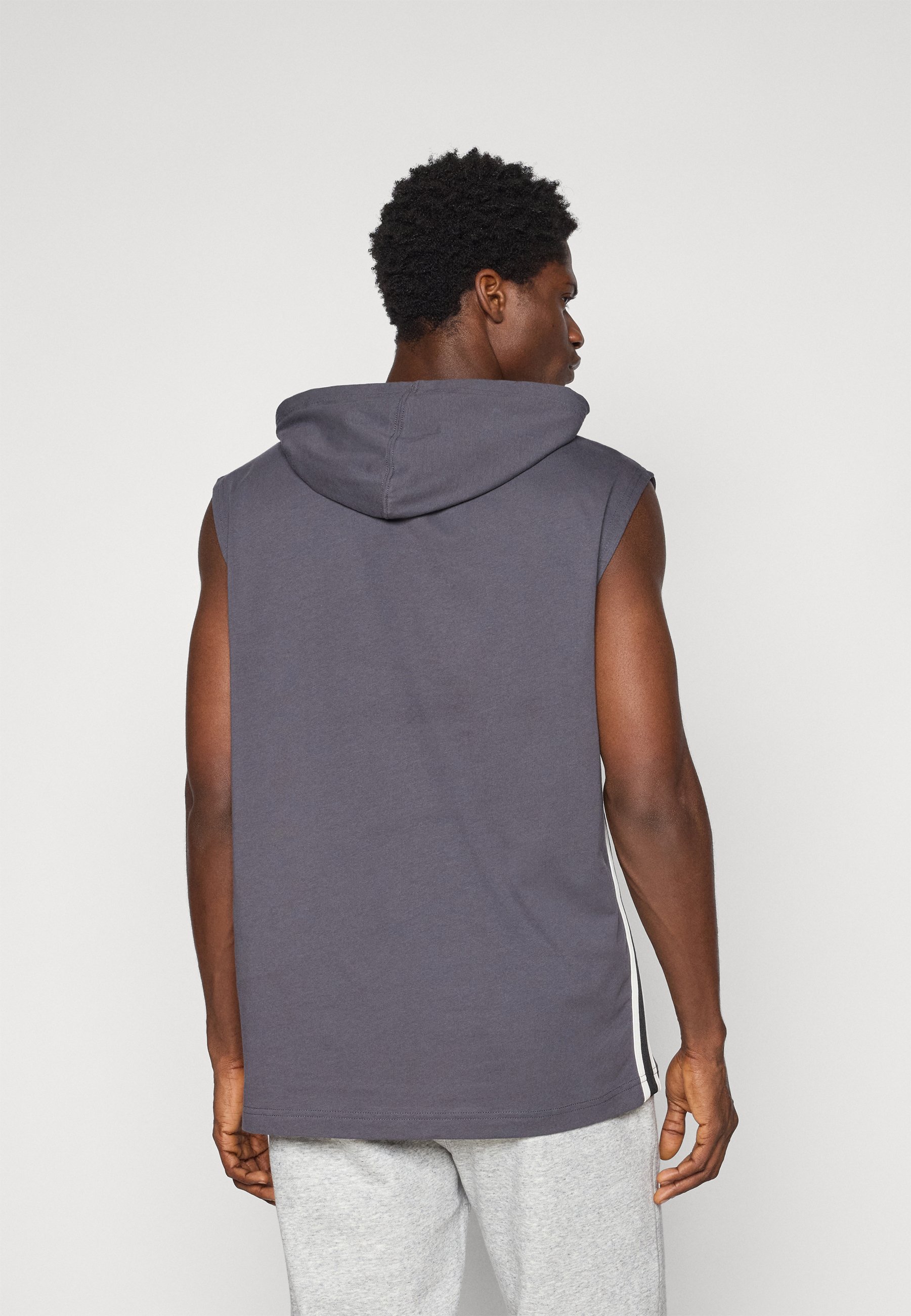 Champion SLEEVELES HOODIE - Triko s potiskem - black