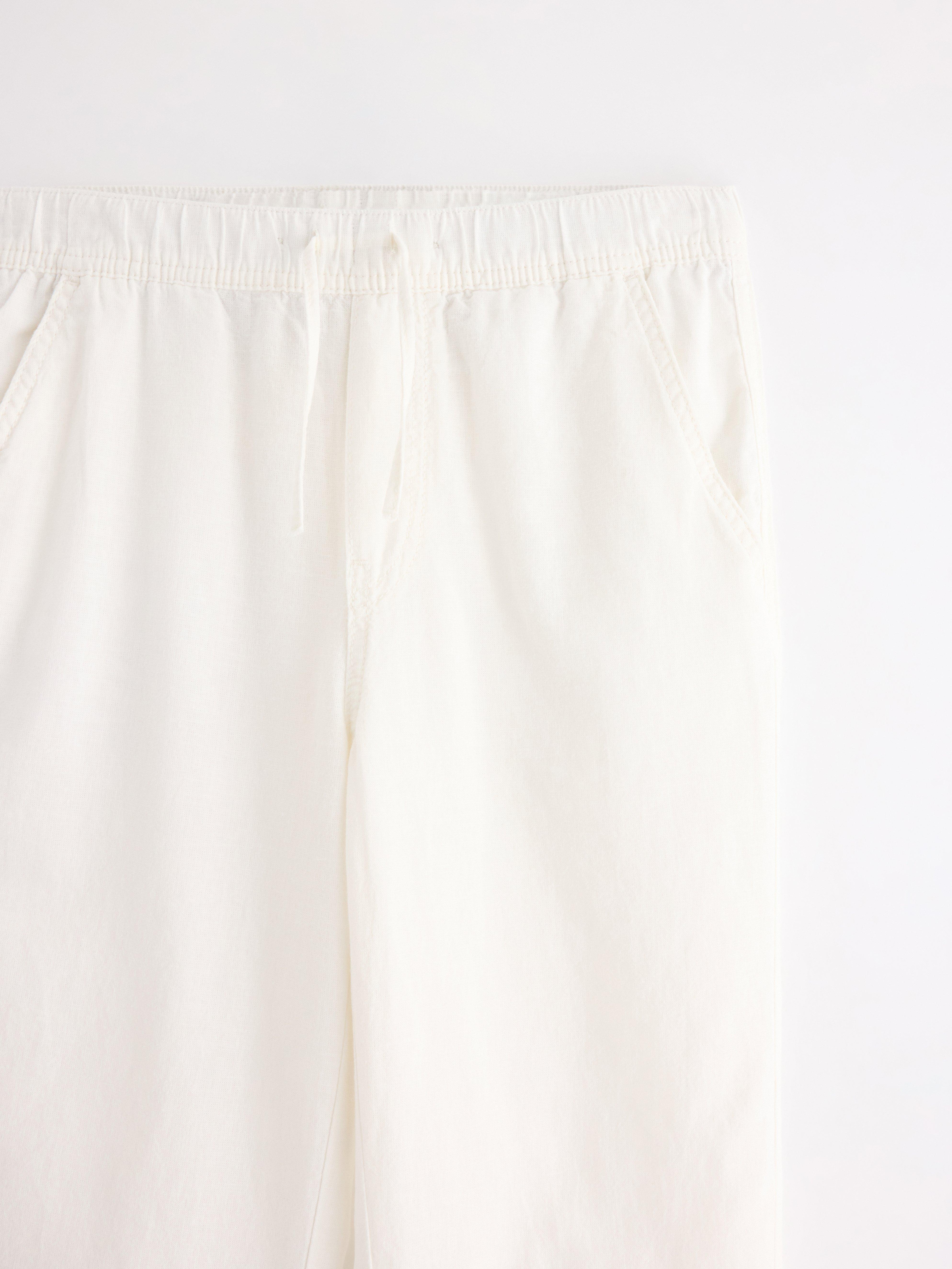 Pantalones rectos STAFFAN de mezcla de lino, color blanco roto.