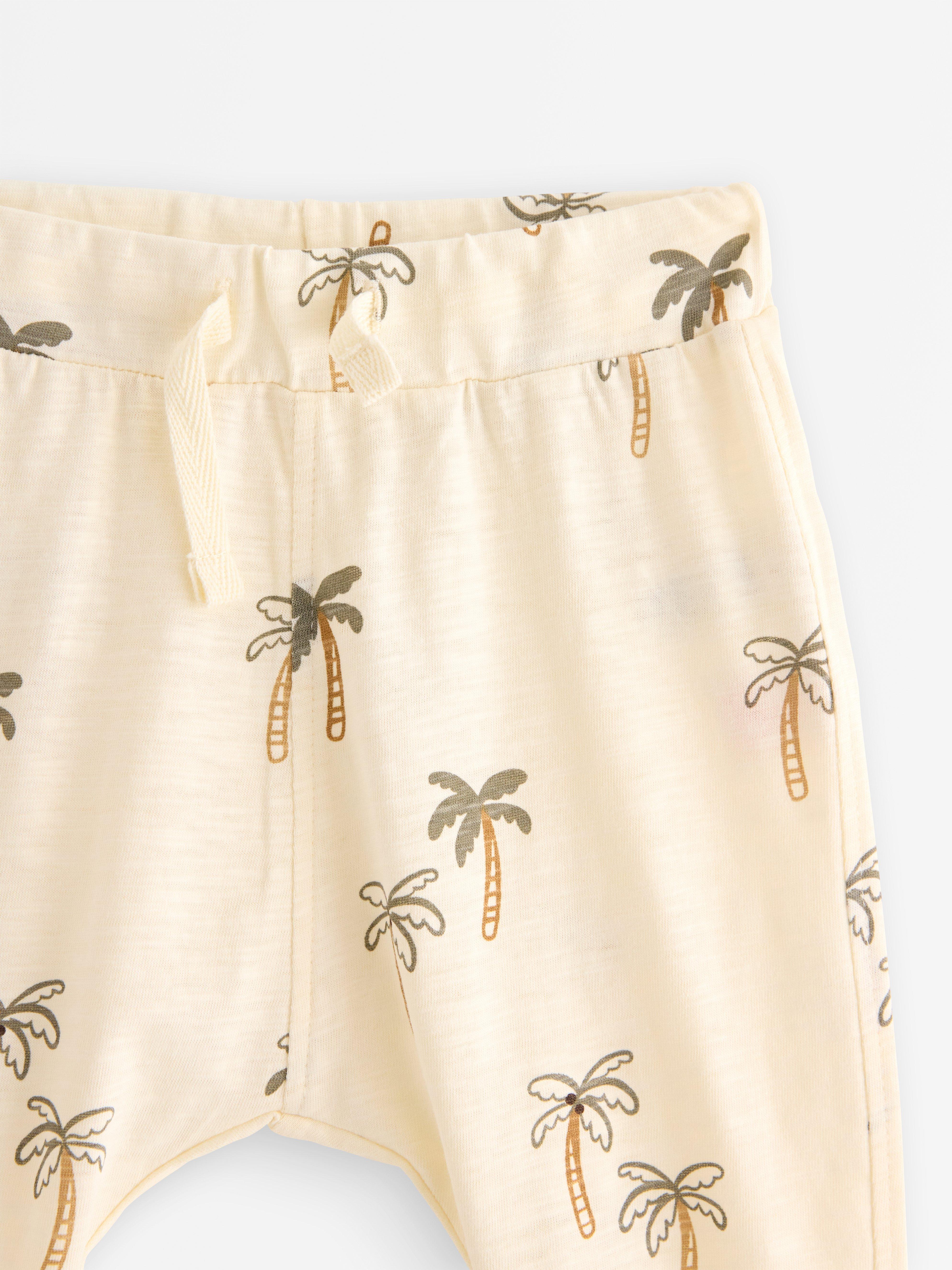 Pantalones deportivos de punto flameado blancos