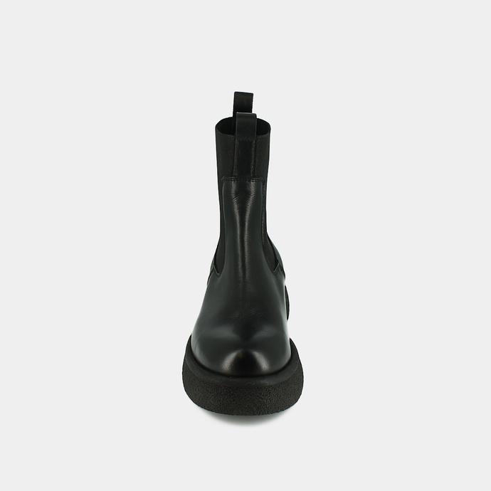 Boots à plateformes, élastiques et bouts...  en cuir noir