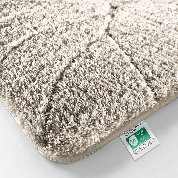 Alfombrilla de baño Maris de microfibra suave – Alfombrilla antideslizante de felpa con estampado de hojas, 60 x 120 cm, color marfil.