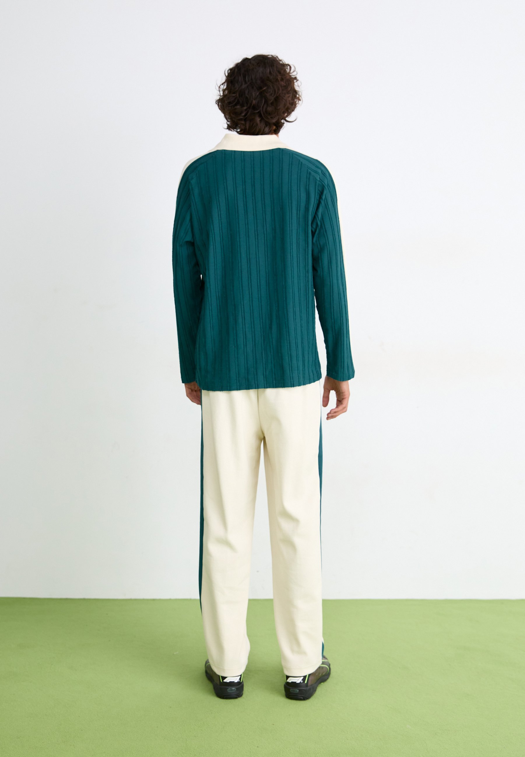 Puma JACQUARD - Trainingsbroek - alpine sneeuw/groen terrein