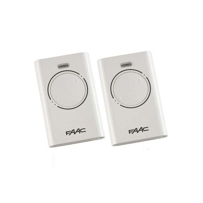 Pacote com 2 controles remotos FAAC XT2 para portão e garagem.